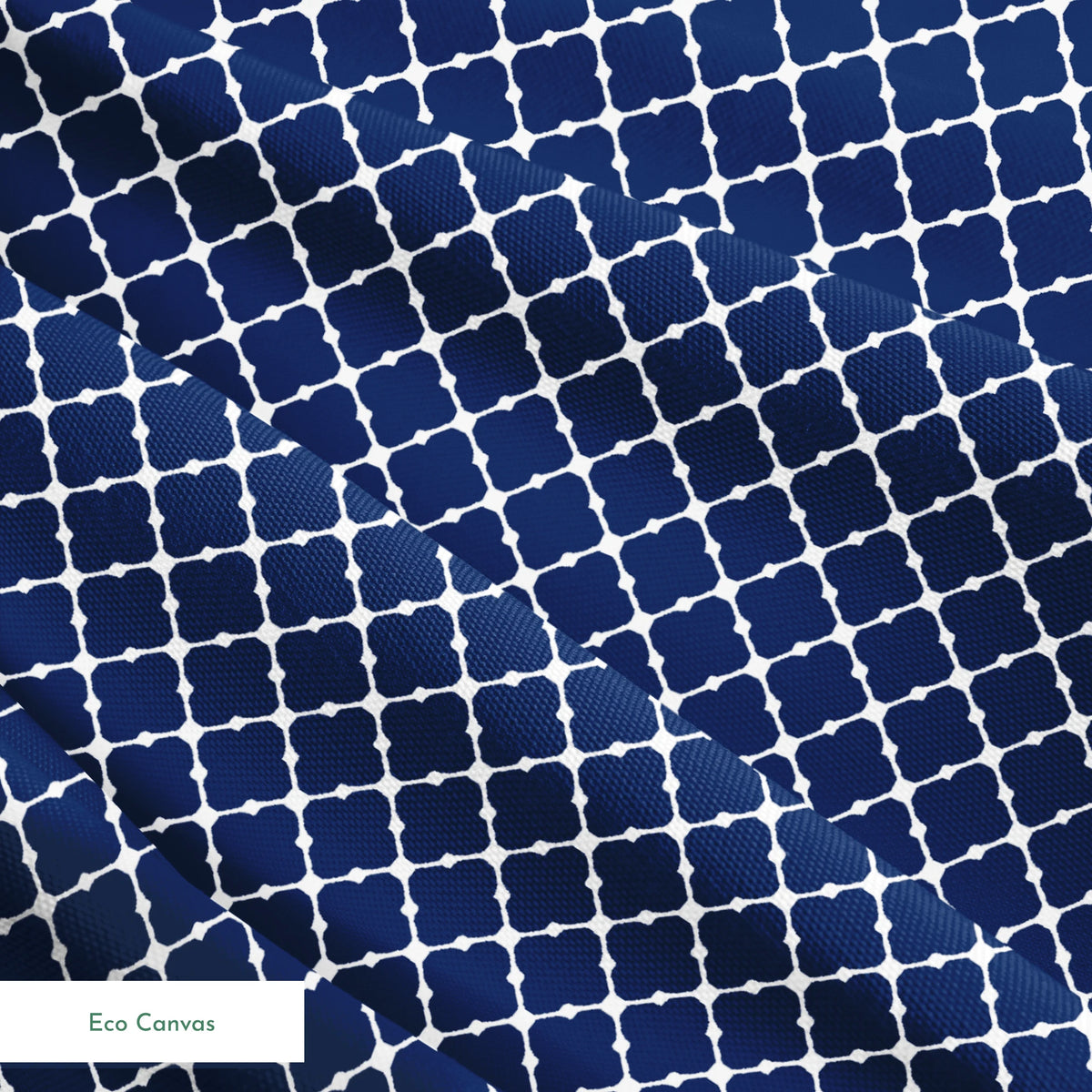 Navy blue quatrefoil pattern with white lattice design on dark background springs ecocanvas texture