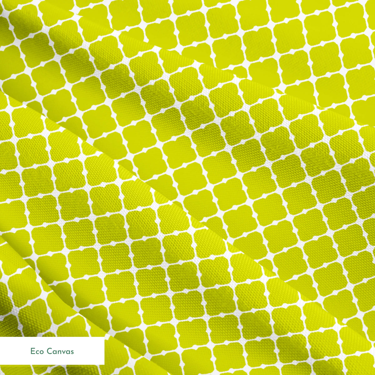 Chartreuse green quatrefoil pattern on white background, forming a geometric lattice design springs ecocanvas texture