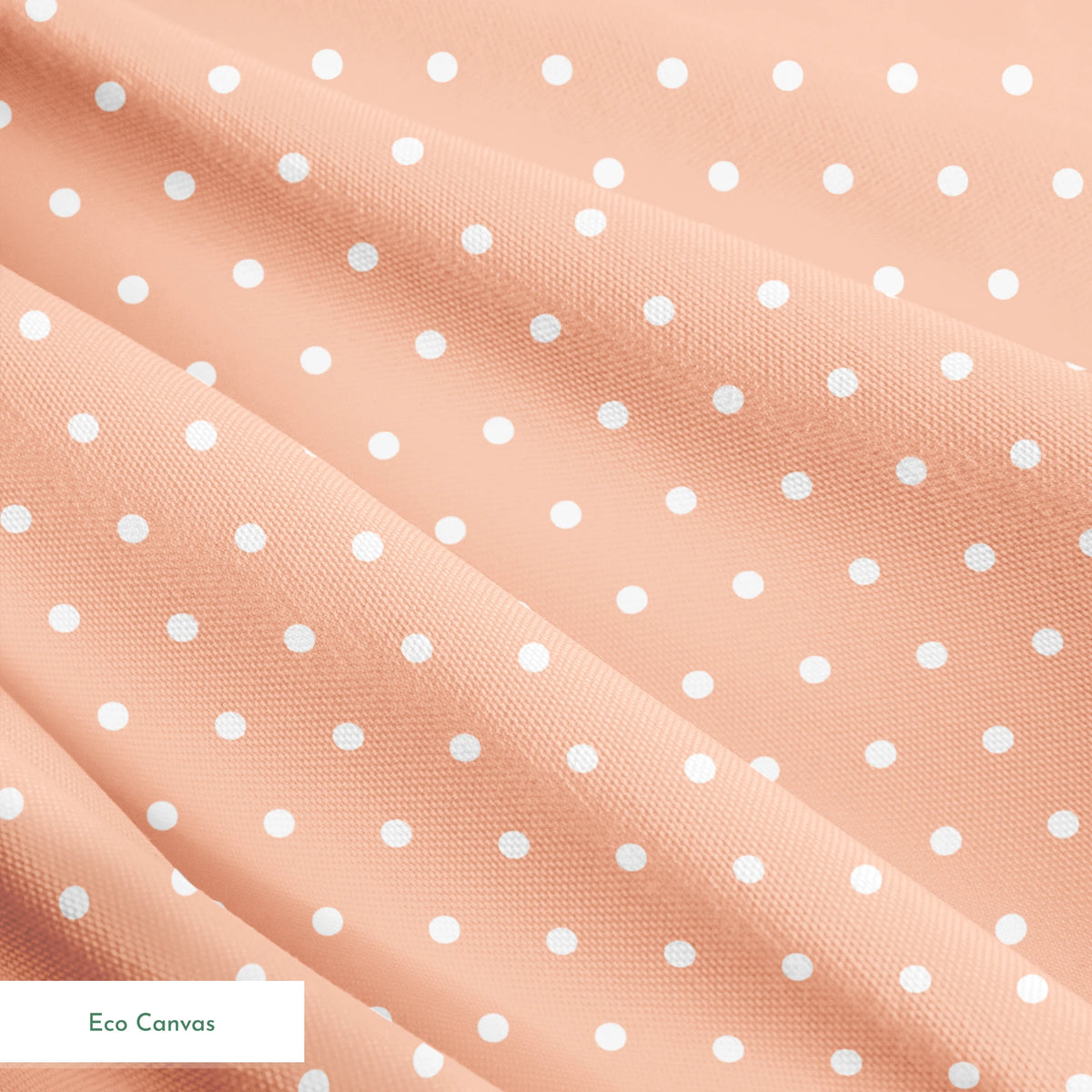 White circles on a peach/salmon colored background springs ecocanvas texture