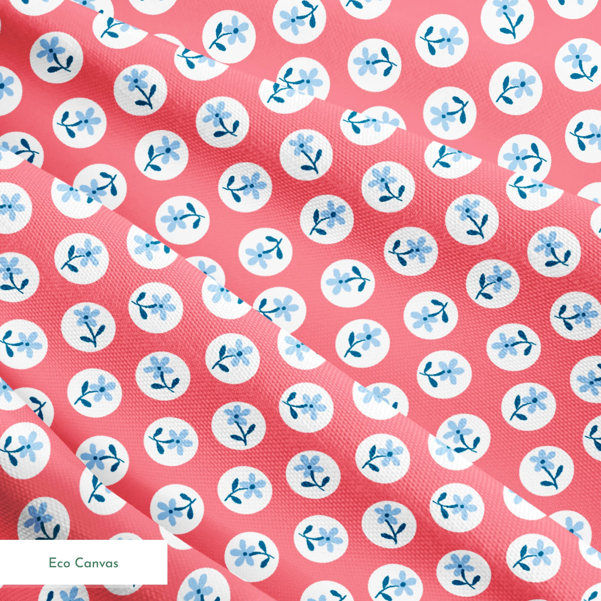 Coral pink background with white circles containing light blue floral designs arranged in a pattern springs ecocanvas texture