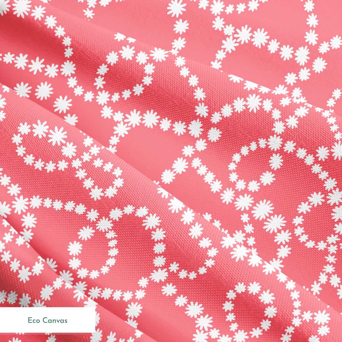 White dot patterns forming swirling chains on coral pink background springs ecocanvas texture