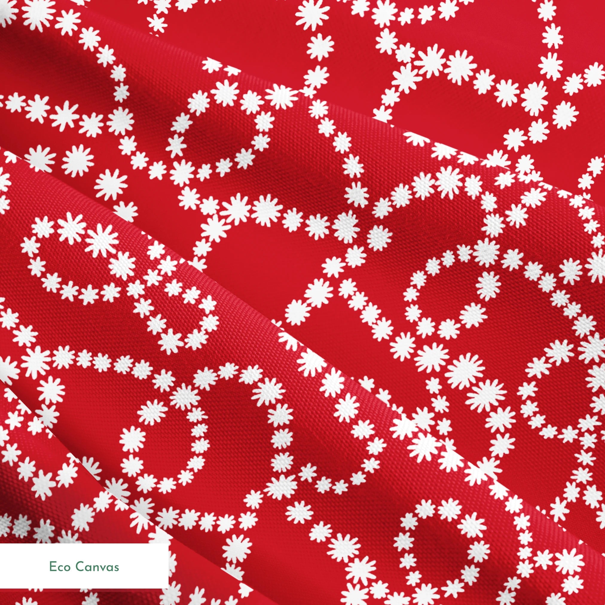 White dotted swirl pattern on rich red background creating decorative curving lines springs ecocanvas texture