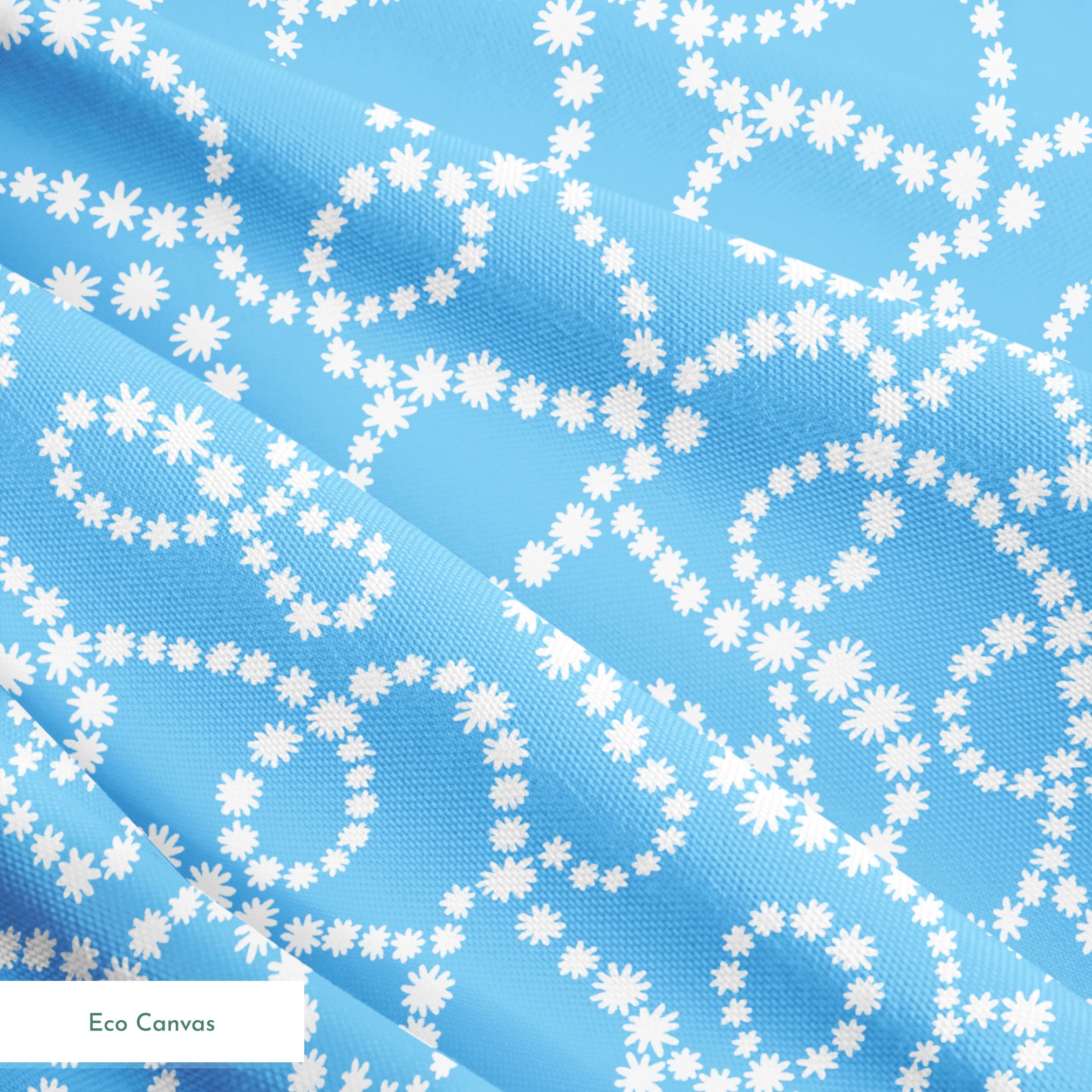 Sky blue background with swirling white dotted pattern resembling beaded strings or pearls arranged in curving lines springs ecocanvas texture