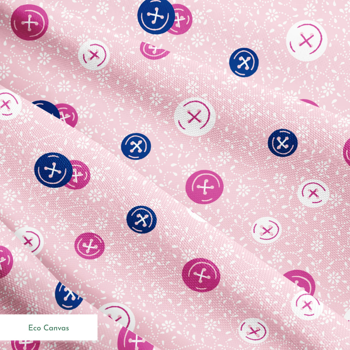 Scattered buttons in white, pink, and navy on a light pink floral background springs ecocanvas texture