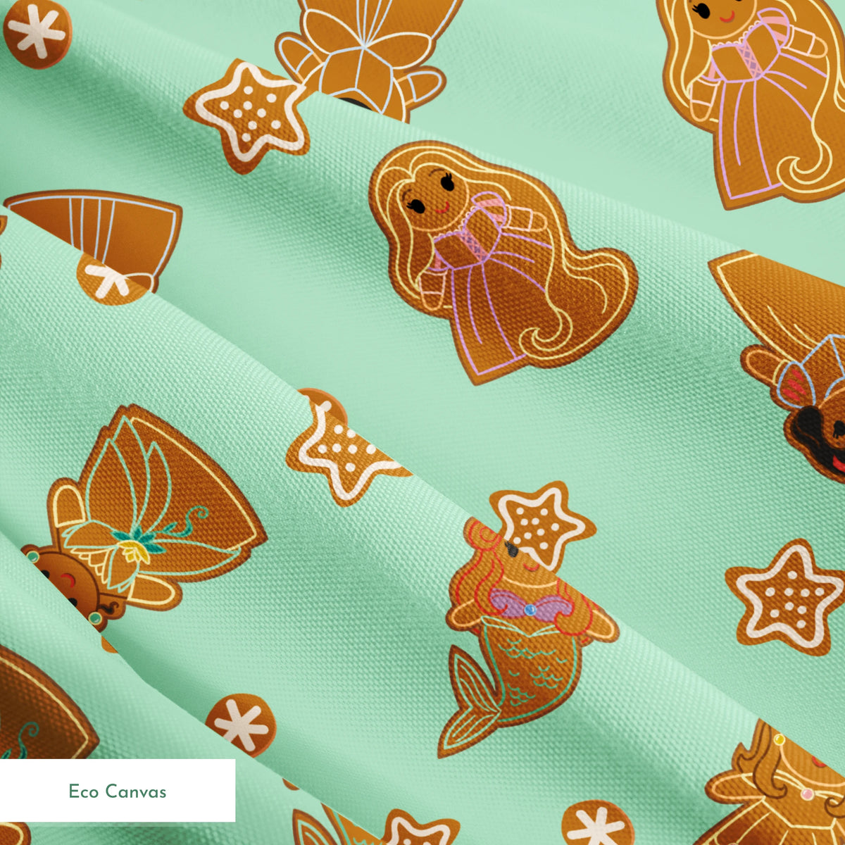 Disney Princess gingerbread cookies with star and snowflake designs on mint green background springs ecocanvas texture