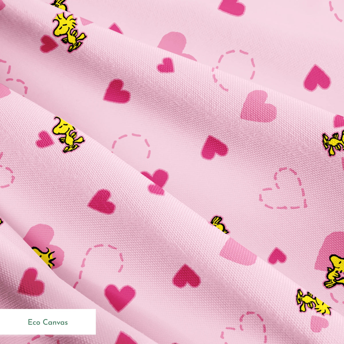 Pink background with hearts and Woodstock pattern, dotted heart outlines and solid pink hearts scattered throughout. springs ecocanvas texture