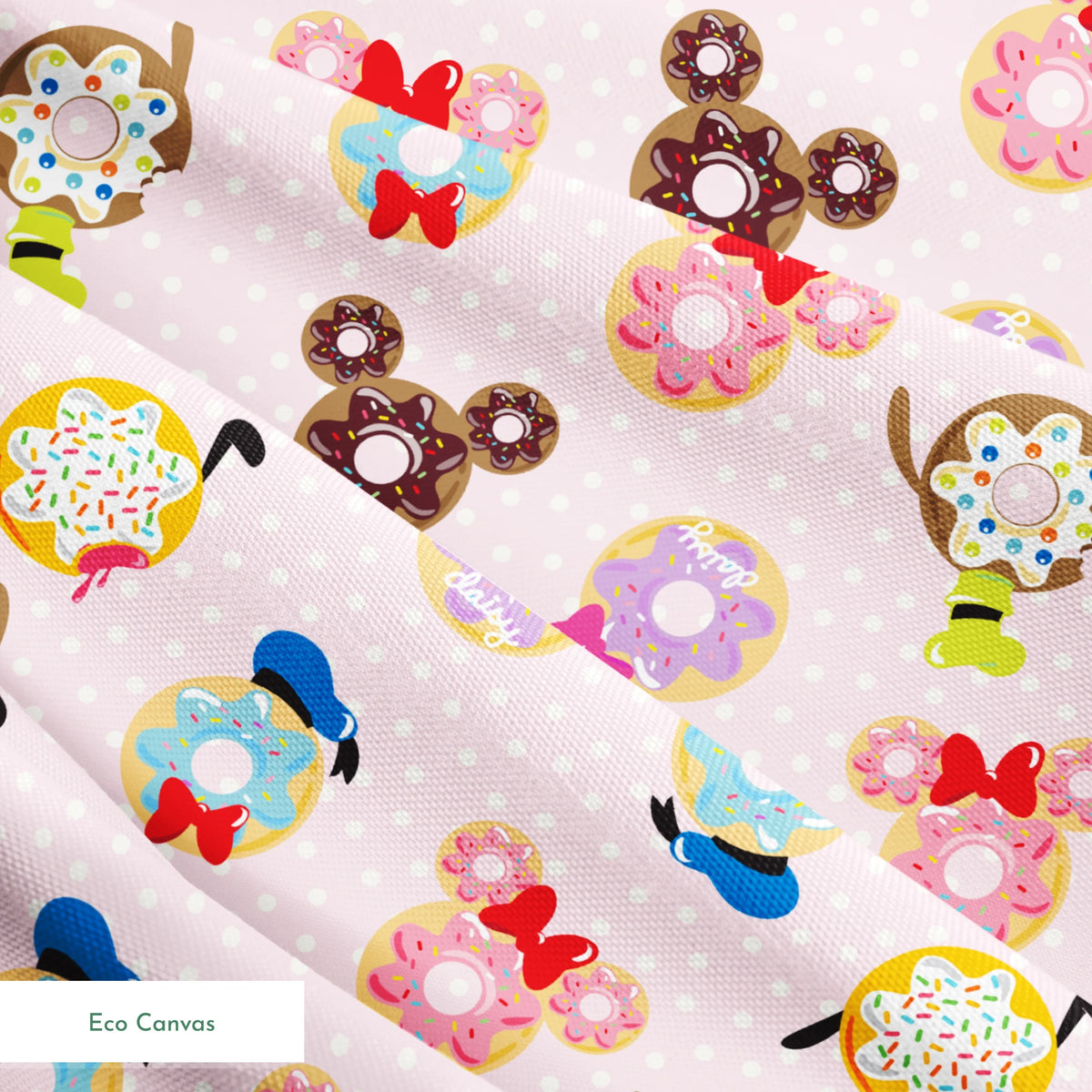 Mickey Mouse & friends donuts in various shapes on a pink polka dot background. springs ecocanvas texture