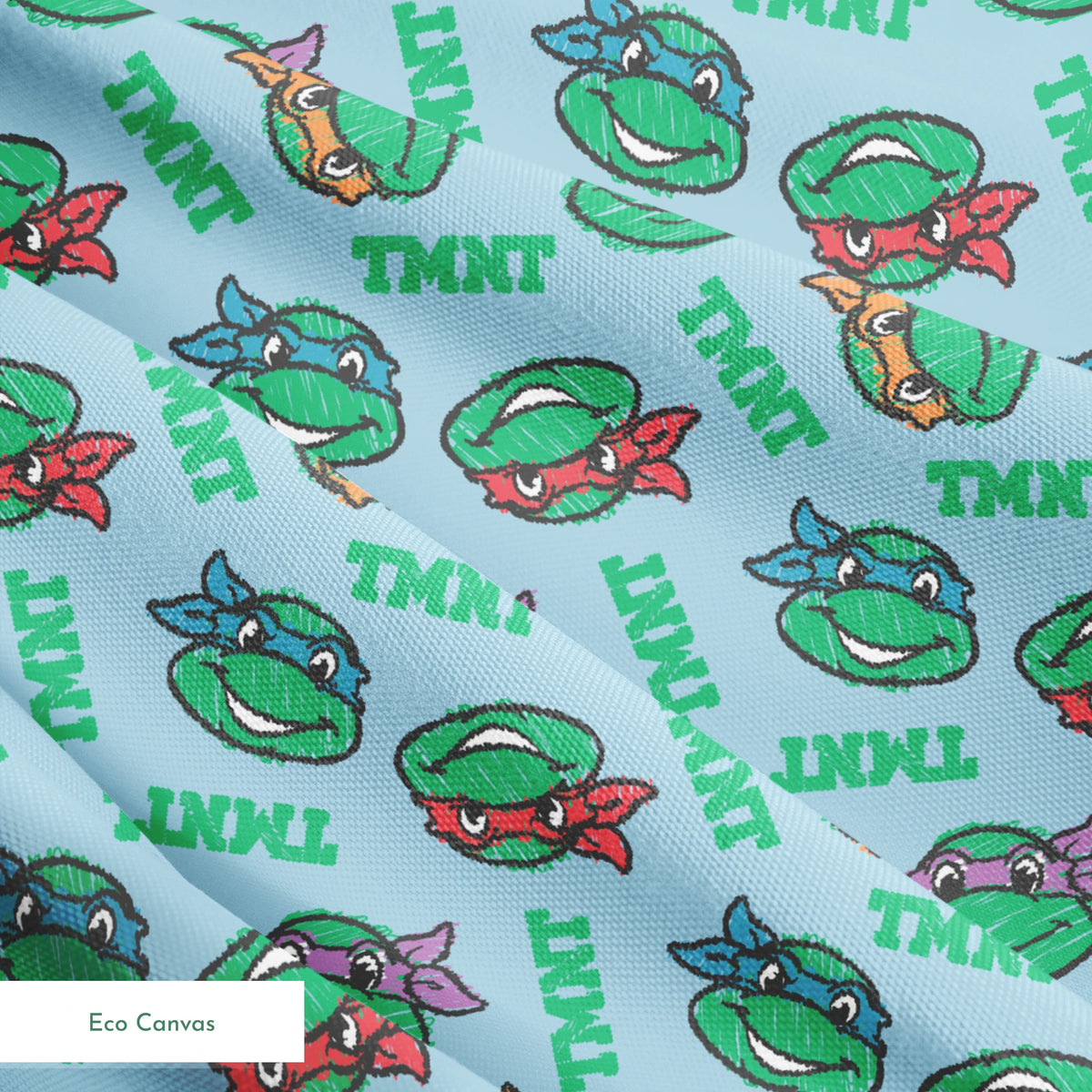 Cartoon pattern of Teenage Mutant Ninja Turtles faces with colored masks on light blue background springs ecocanvas texture