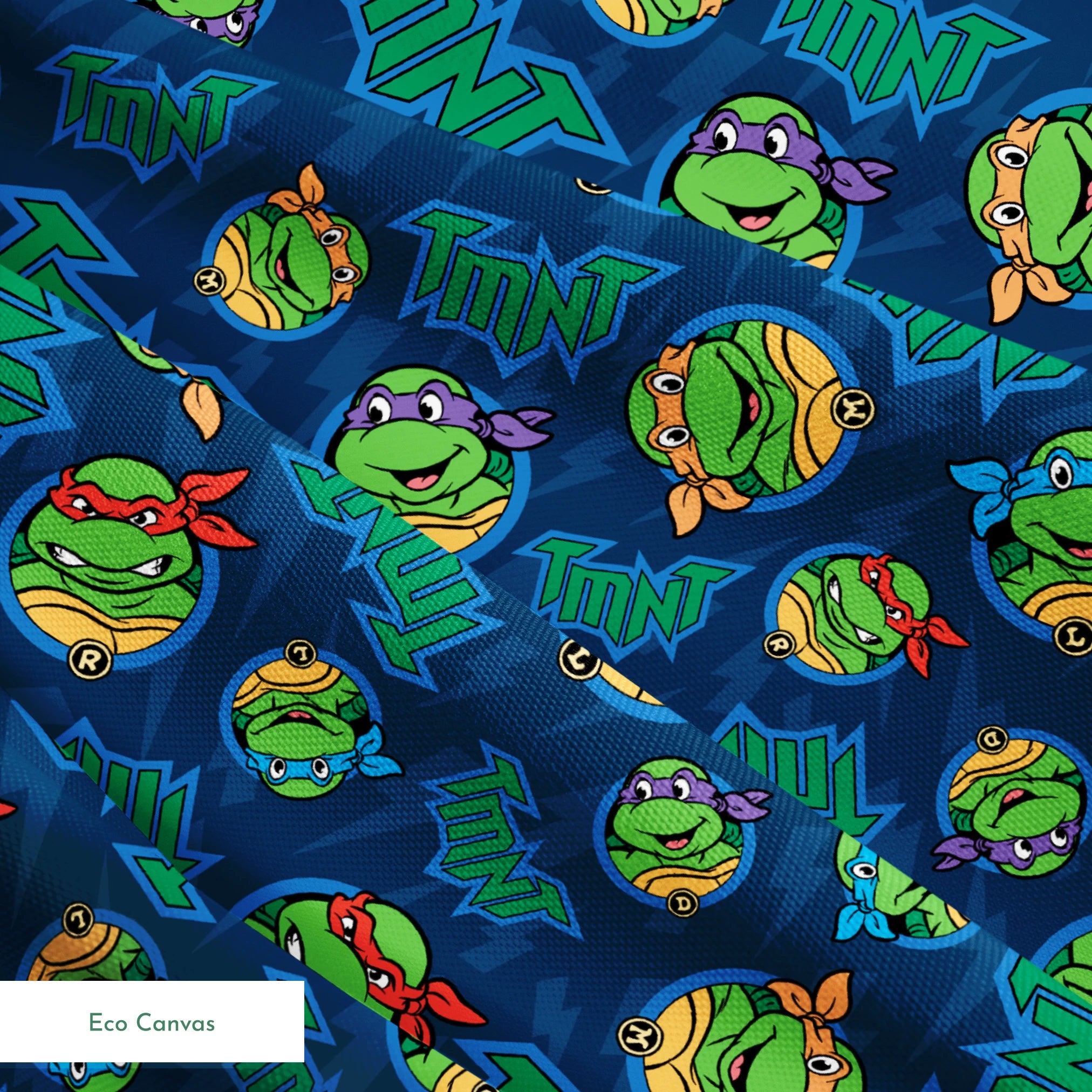 Teenage Mutant Ninja Turtles pattern with character heads and TMNT logos on blue background springs ecocanvas texture