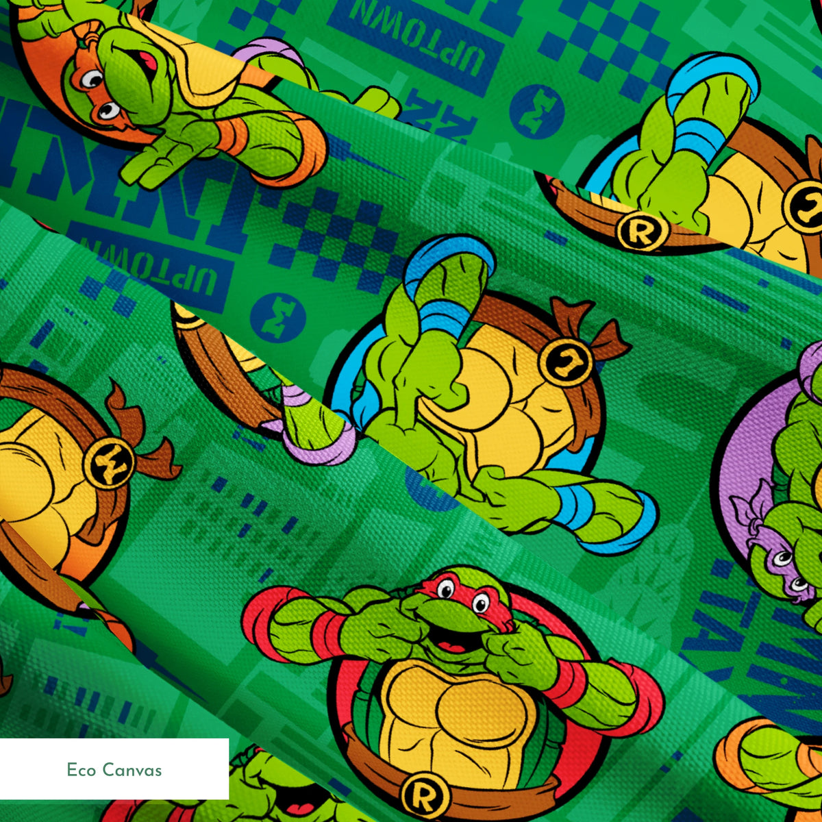 Teenage Mutant Ninja Turtles cartoon characters on green patterned background springs ecocanvas texture