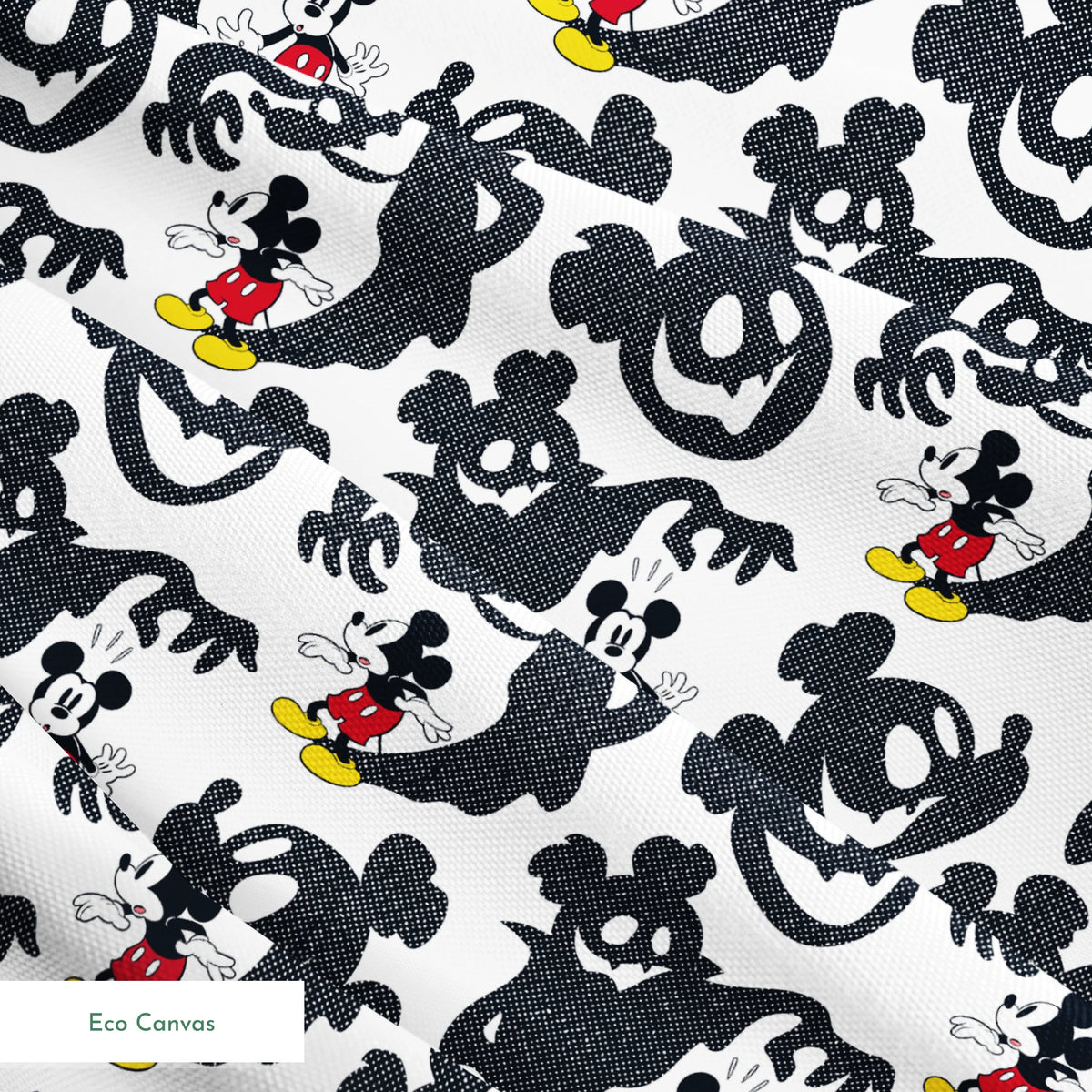 Mickey Mouse pattern with black ghost silhouettes on white background springs ecocanvas texture
