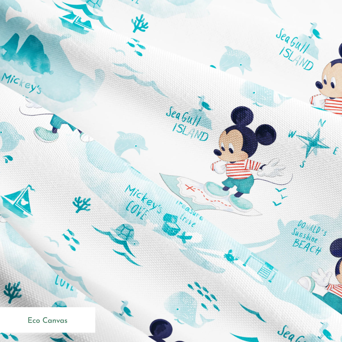 Cartoon Mickey Mouse pattern with turquoise ocean elements, sharks, waves, and "Safari" text springs ecocanvas texture