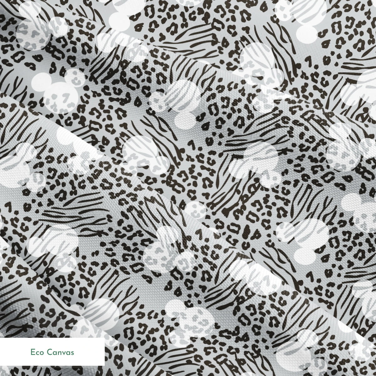 Animal print pattern with zebra stripes and leopard spots in black and white on gray background springs ecocanvas texture