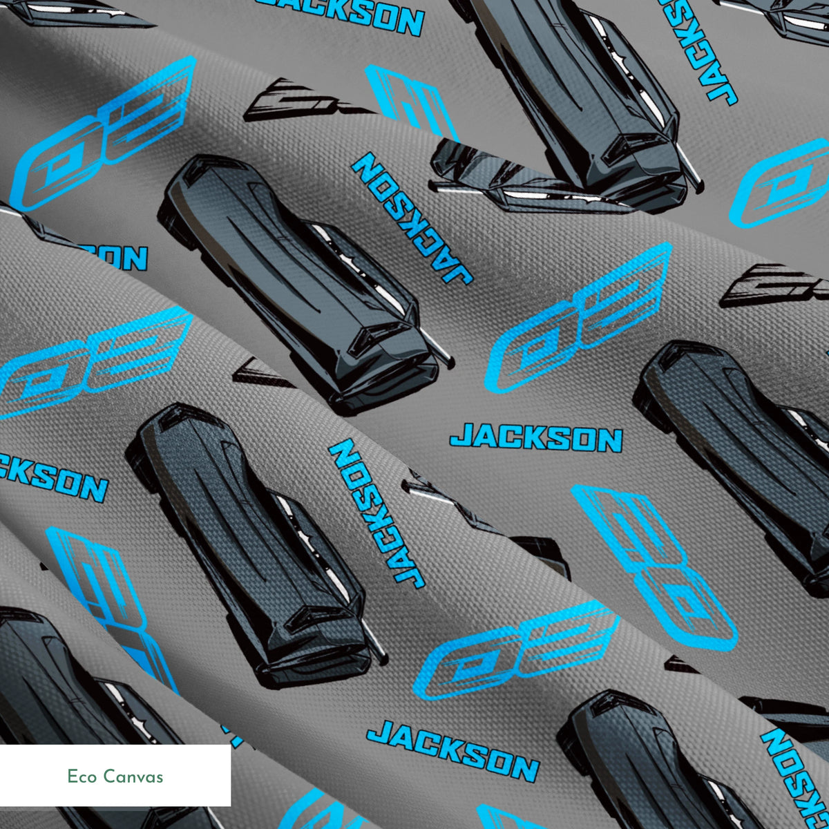 Dark gray background with scattered black car parts and blue "JACKSON" text and stylized logos in a repeating pattern springs ecocanvas texture