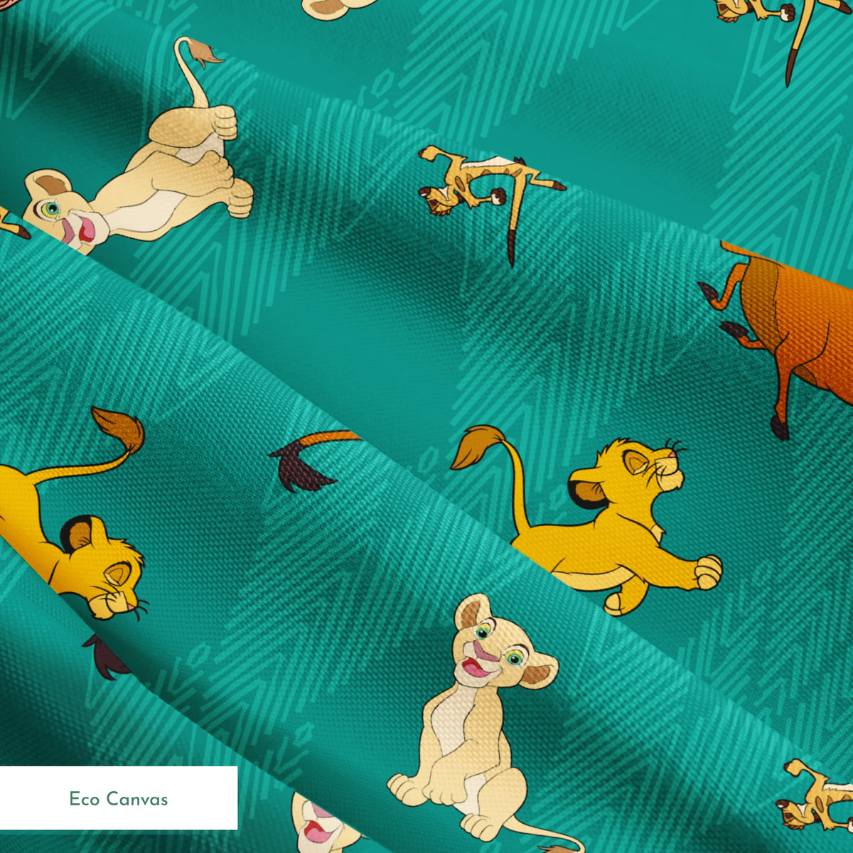 Lion cubs in various poses on teal zigzag background; yellow, cream, and brown lions jumping and sitting springs ecocanvas texture