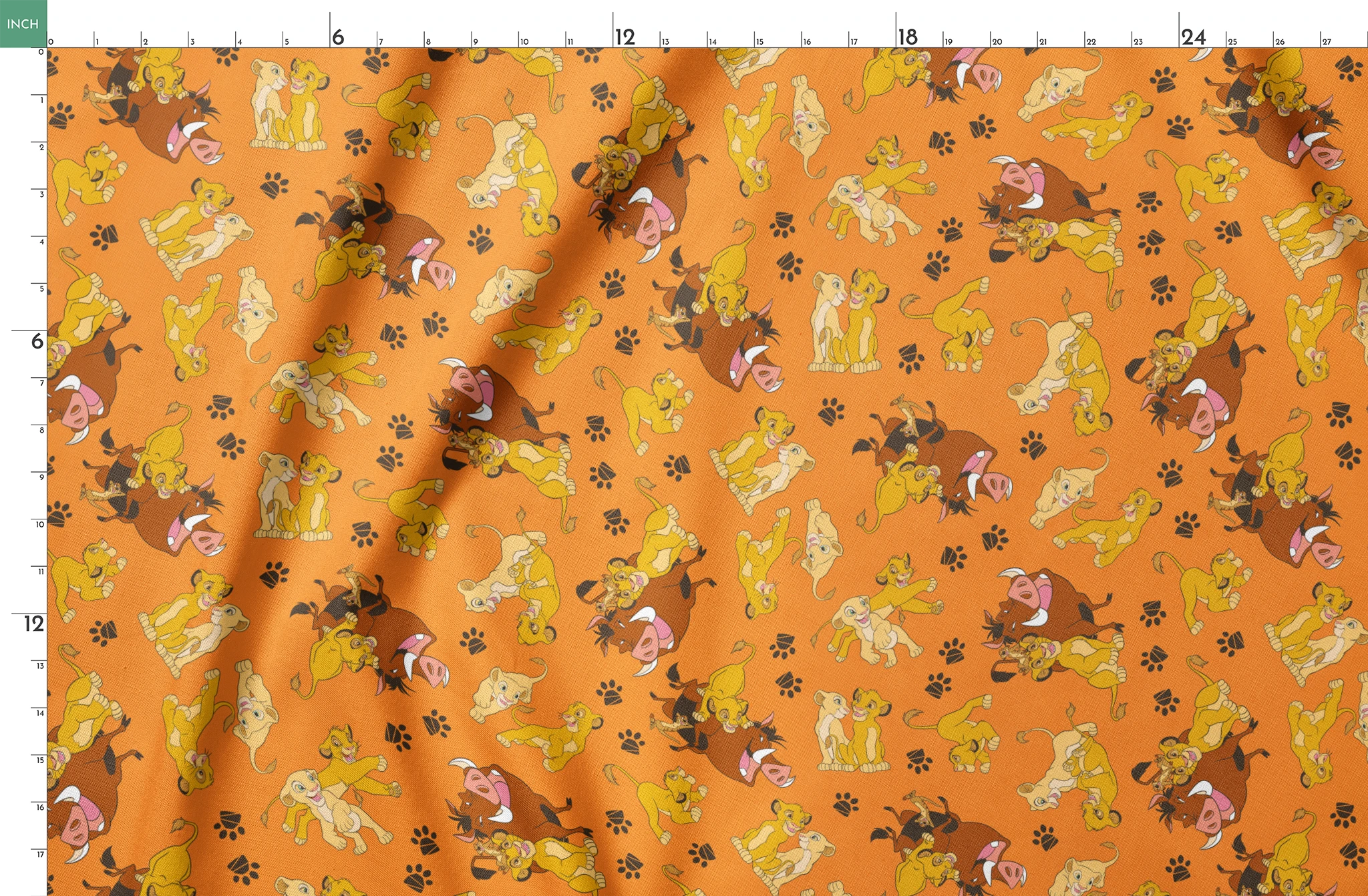 Playful pattern of cartoon cubs in yellow and brown poses on bright orange background with pawprints springs fatquarter mockup