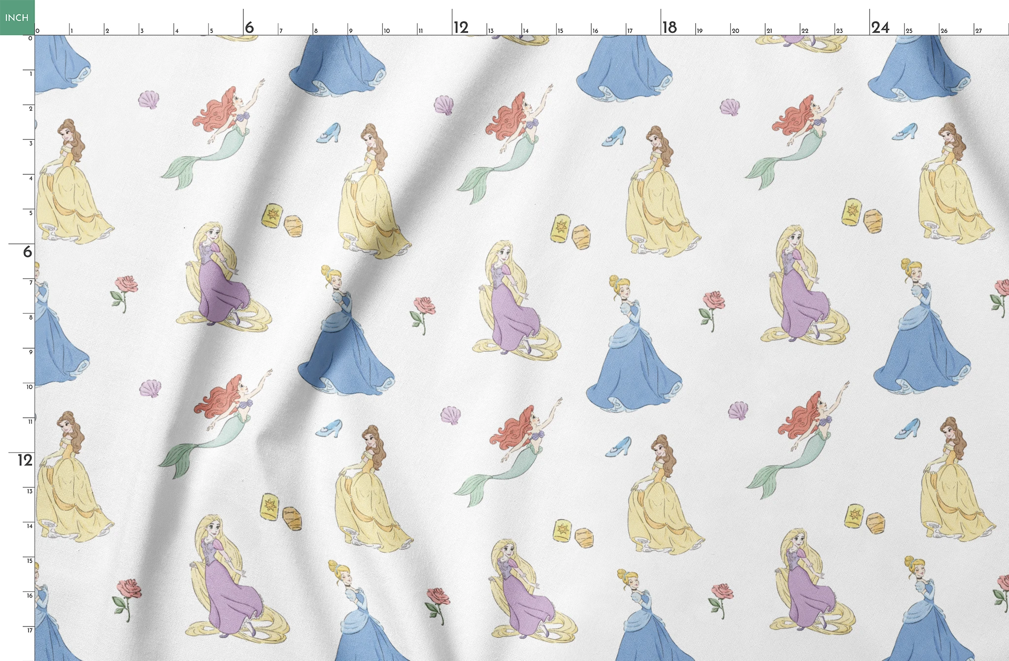 Disney princesses pattern with yellow gown, mermaid with tail, purple dress, roses and shells on light blue background. springs fatquarter mockup