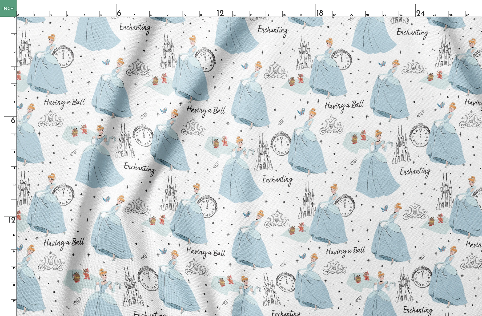 Whimsical pattern featuring cartoon princess in blue gown, clocks, castles, carriages and "Enchanting" text on white background springs fatquarter mockup