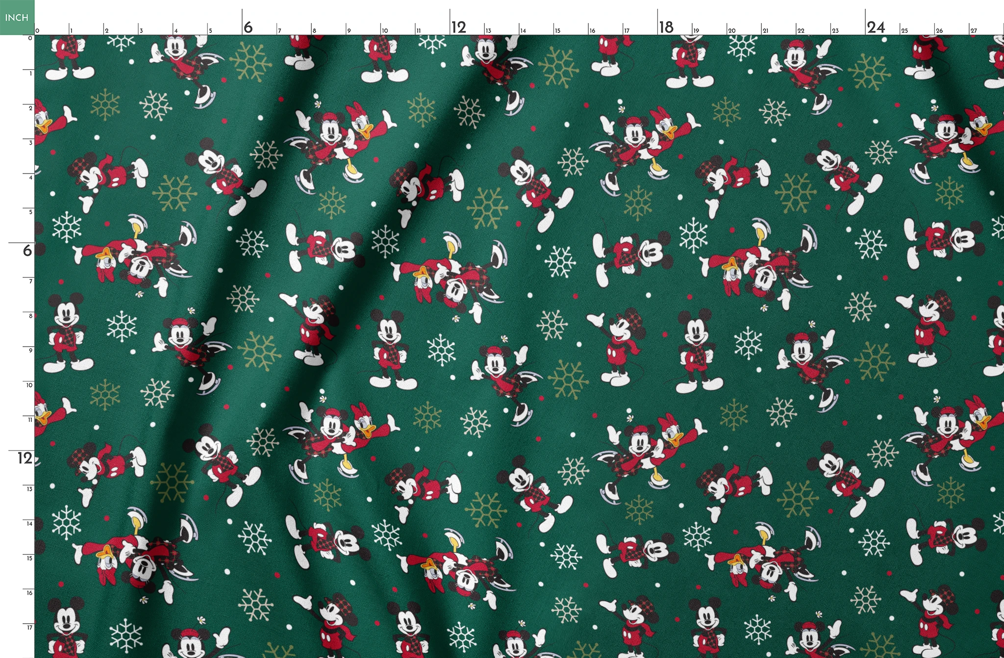 Mickey Mouse Christmas pattern with cartoon characters in winter outfits on green background with snowflakes springs fatquarter mockup
