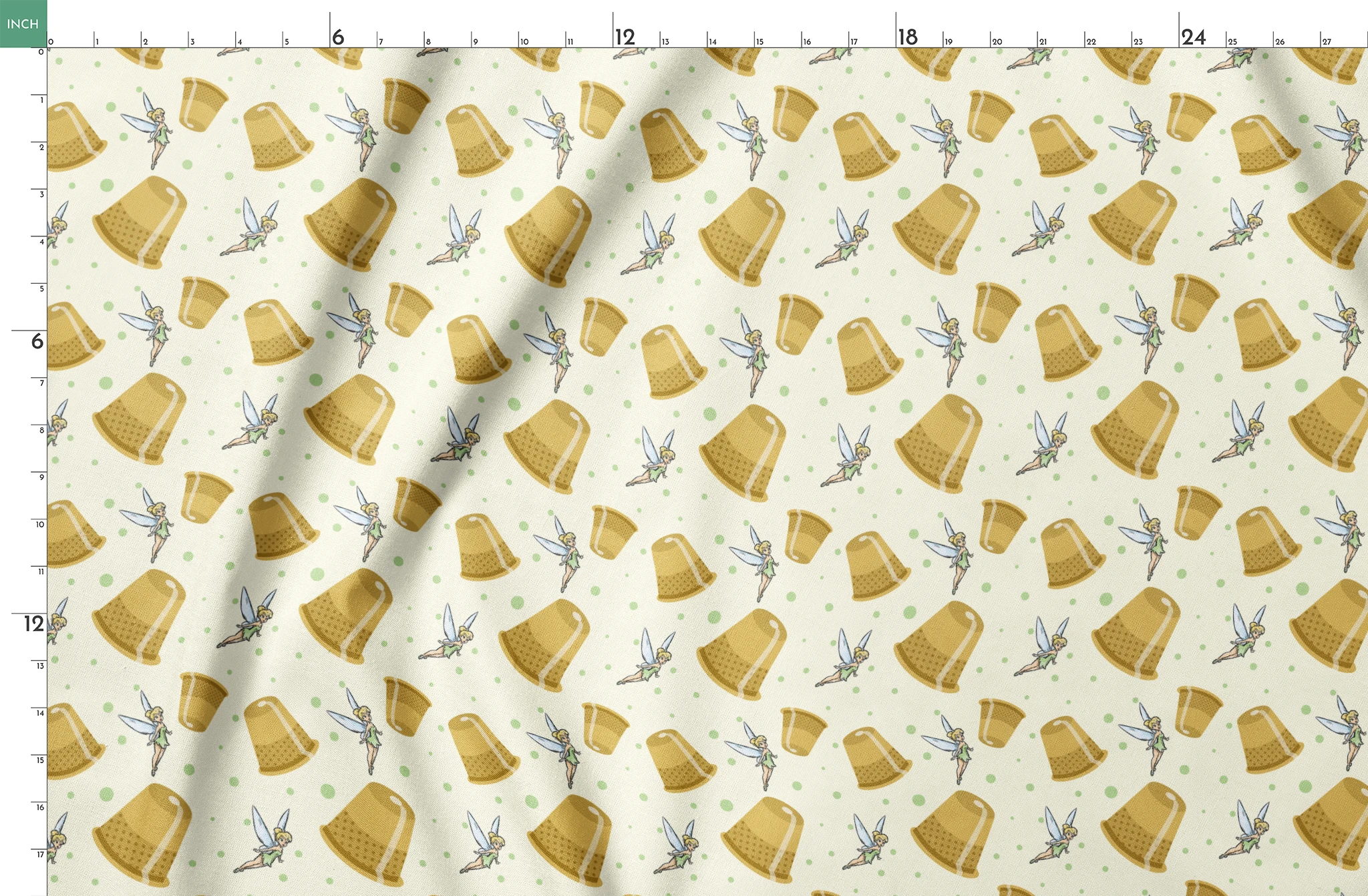 A pattern featuring Tinkerbell fairy with golden thimbles on a pale background with green dots. springs fatquarter mockup