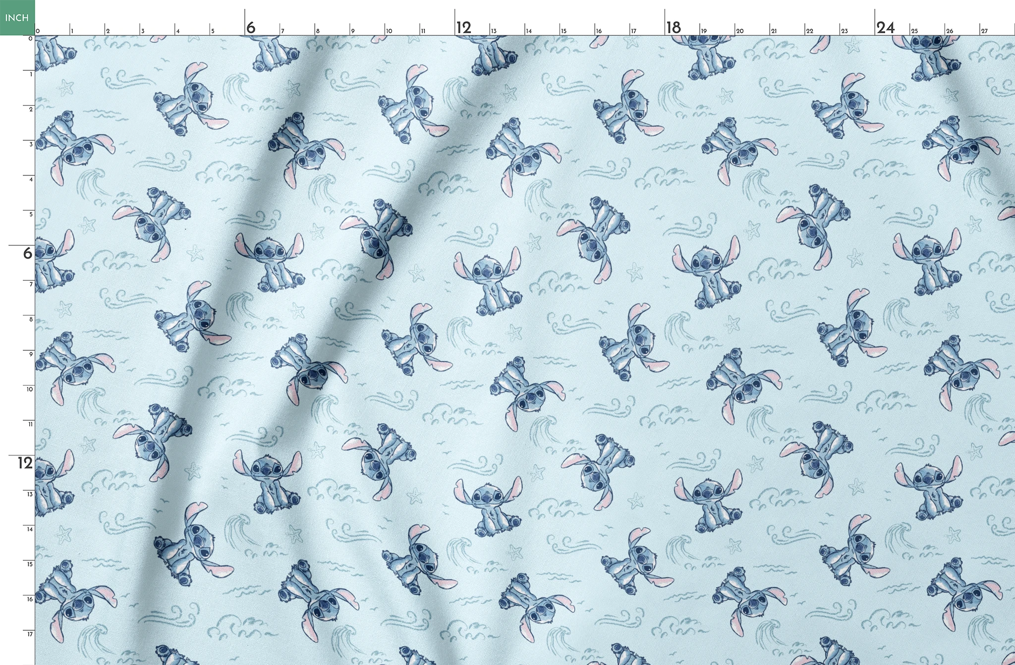 Blue cartoon alien characters with large ears in playful poses against light blue background with swirls and stars pattern springs fatquarter mockup