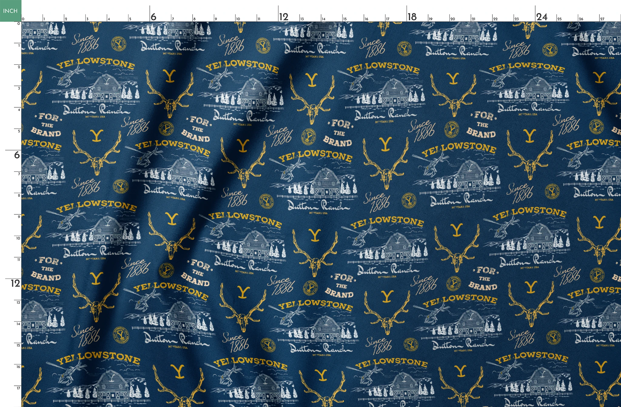 Yellowstone-themed pattern with Dutton Ranch logos, deer antlers, and "Y" branding on navy blue background springs fatquarter mockup