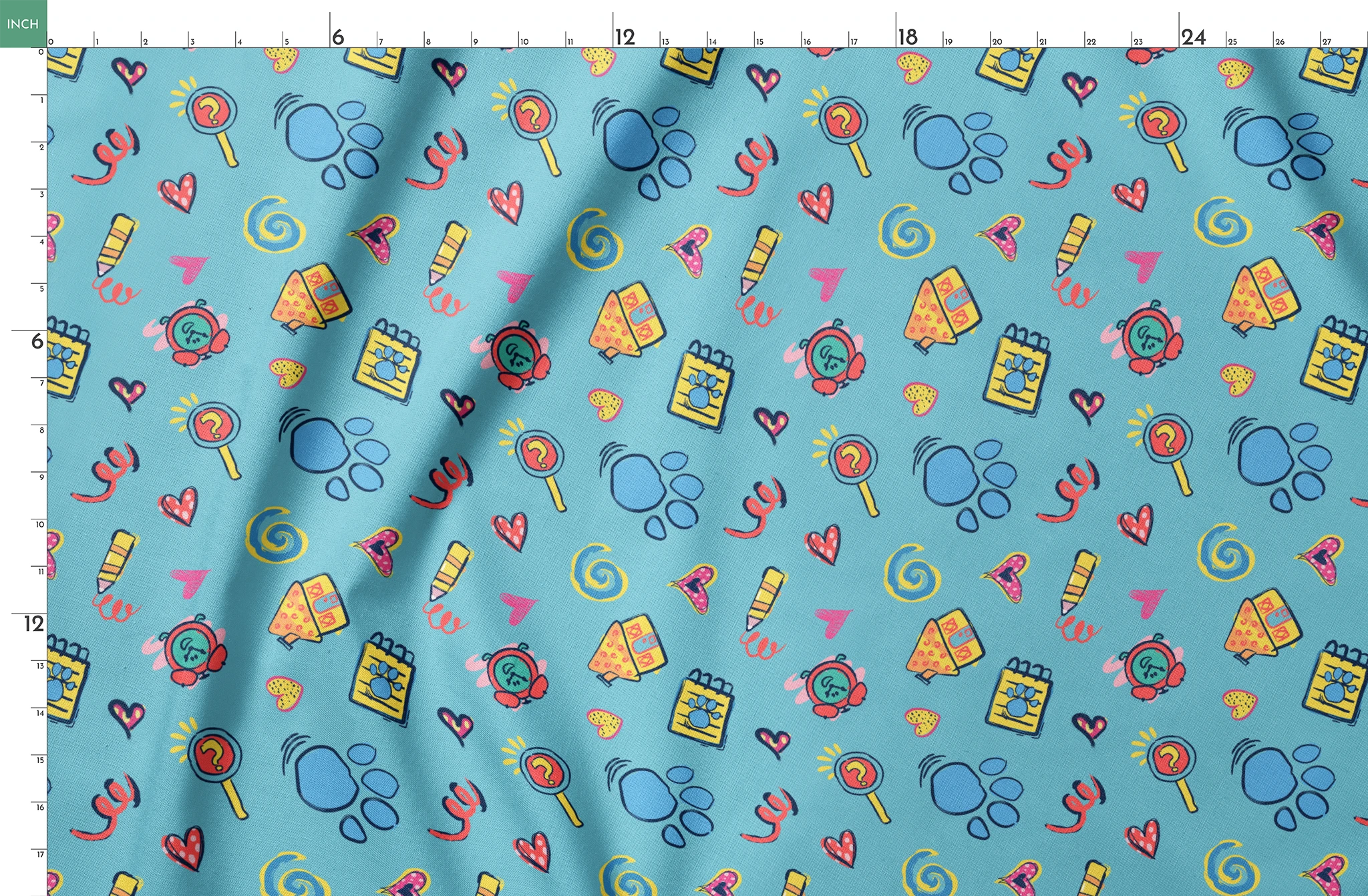 Blue’s Clues doodle-style pattern featuring paw prints, a crayon, spiral notebook, hearts, and magnifying glass on a light blue background. springs fatquarter mockup