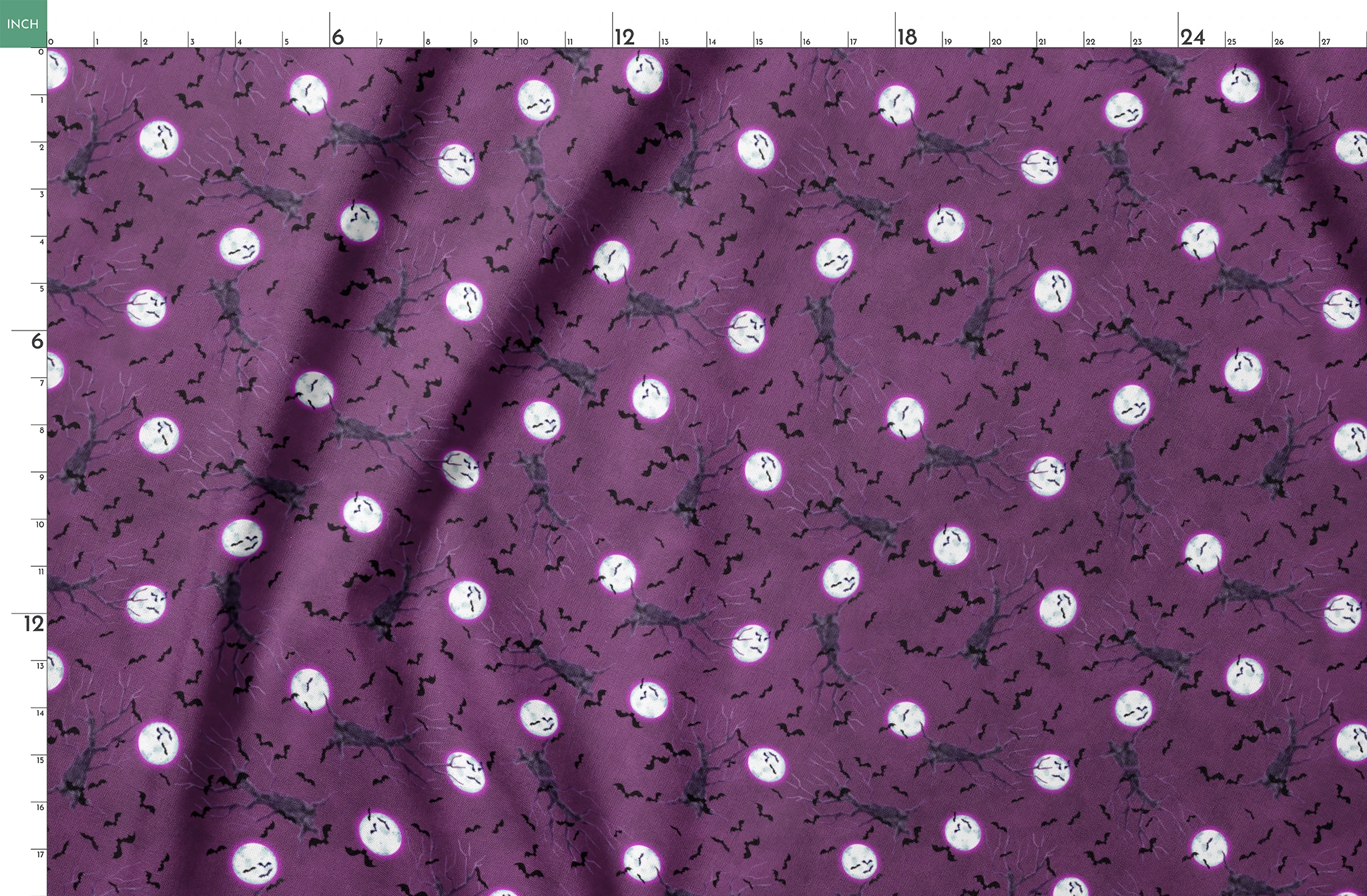 Halloween fabric design with spooky trees, bats, and glowing full moons on a purple background, illustrated by Nicole Tamarin. springs fatquarter mockup