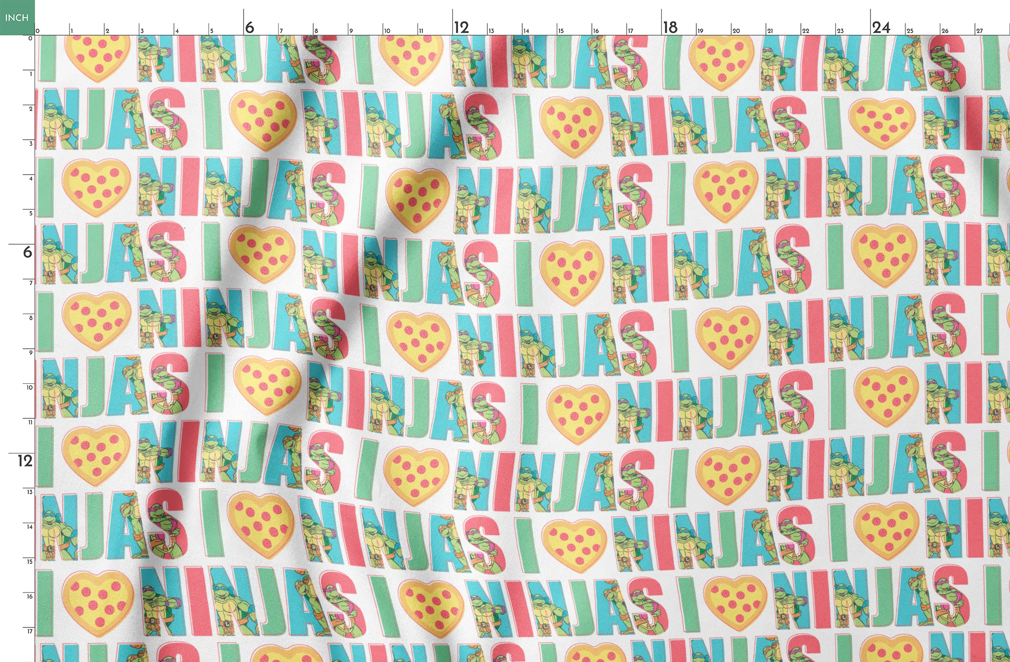 Teenage Mutant Ninja Turtles design with “I heart Ninjas” text with a pizza heart graphic, and Michelangelo and Leonardo in pastel colors. springs fatquarter mockup
