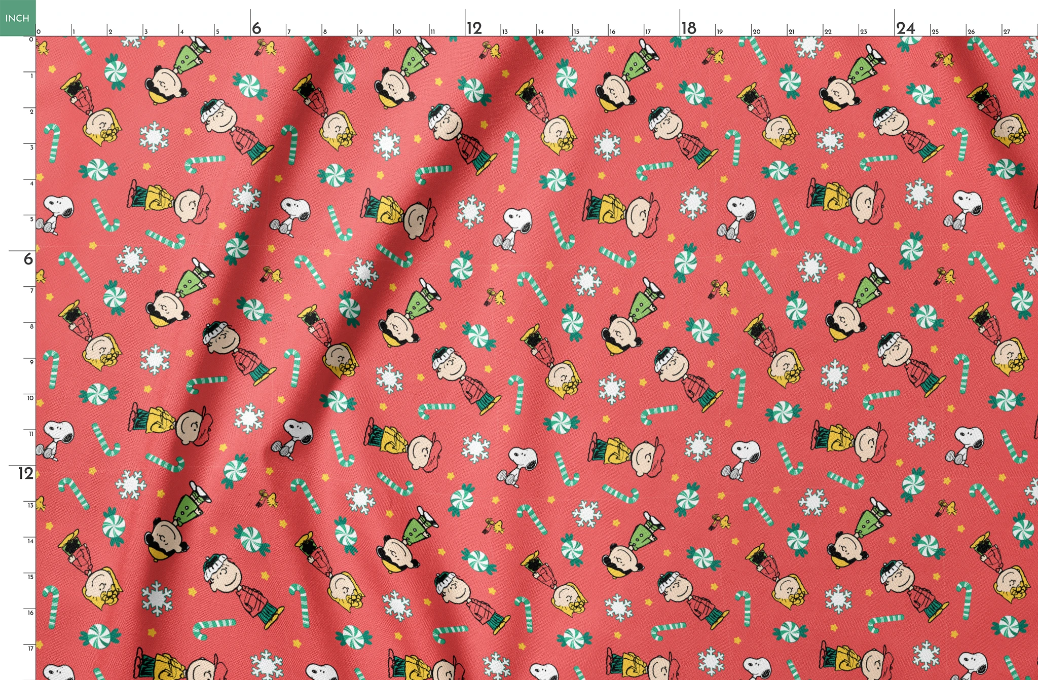 Festive Peanuts cartoon pattern with Charlie Brown characters, candy canes, snowflakes, and peppermints on red background springs fatquarter mockup