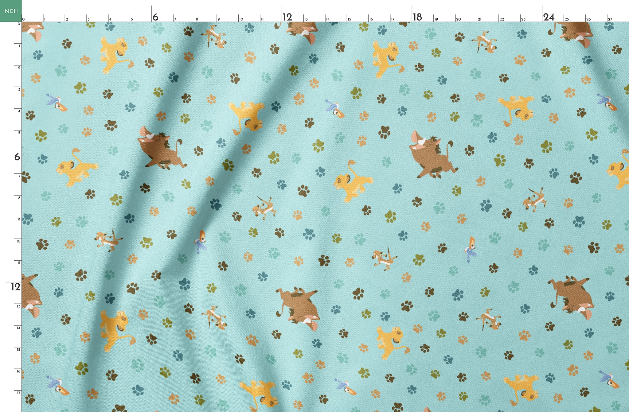 The Lion King pattern with paw prints on light blue background springs fatquarter mockup