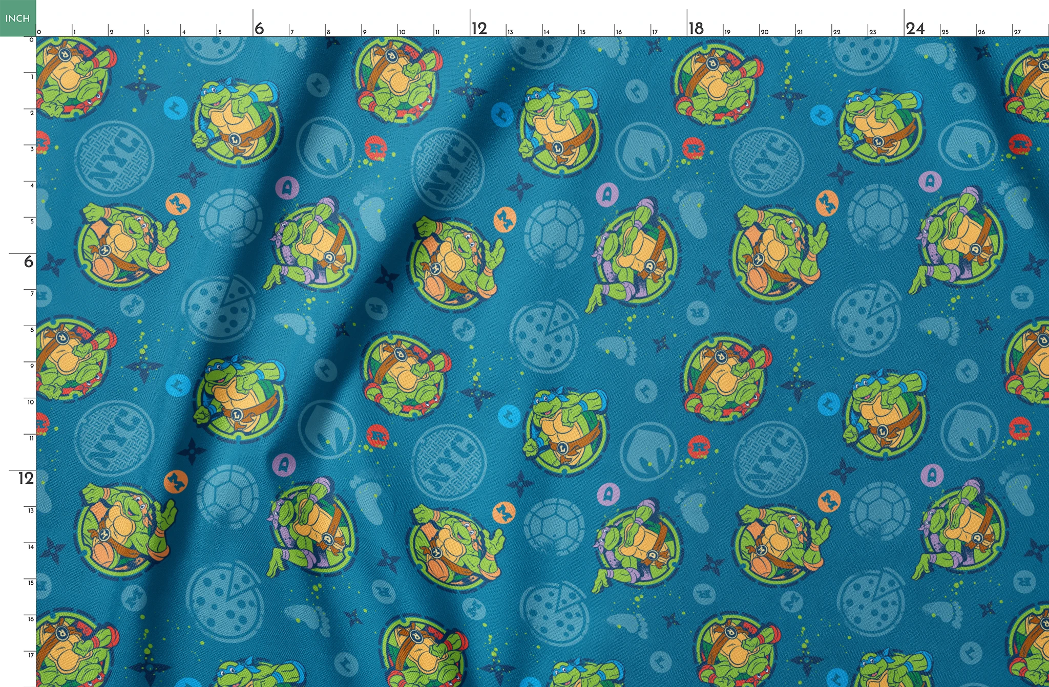 Teenage Mutant Ninja Turtles in circular medallions on teal background with subtle geometric patterns springs fatquarter mockup