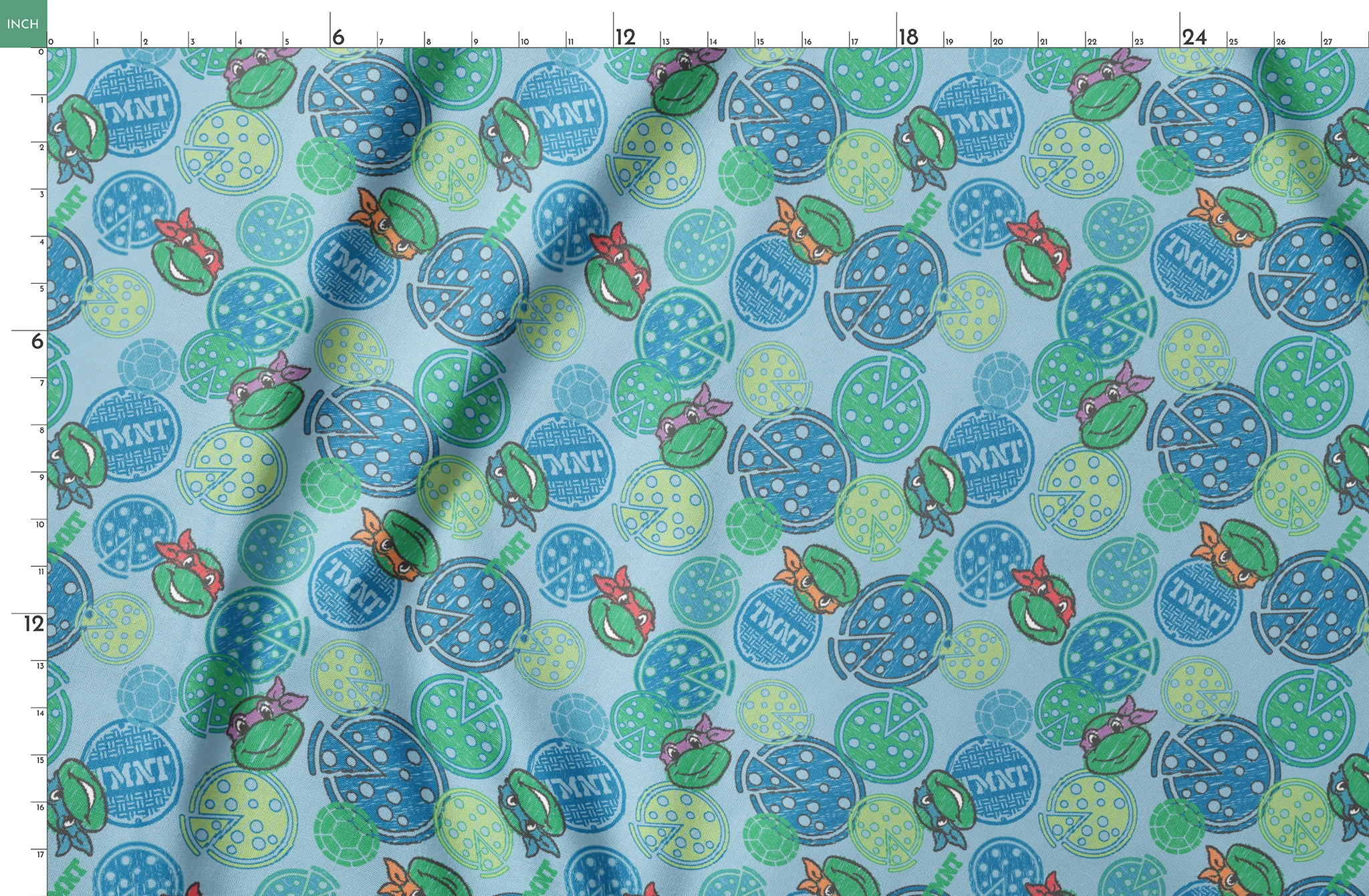 Cartoon Ninja Turtles pattern with colorful circular designs on light blue background springs fatquarter mockup