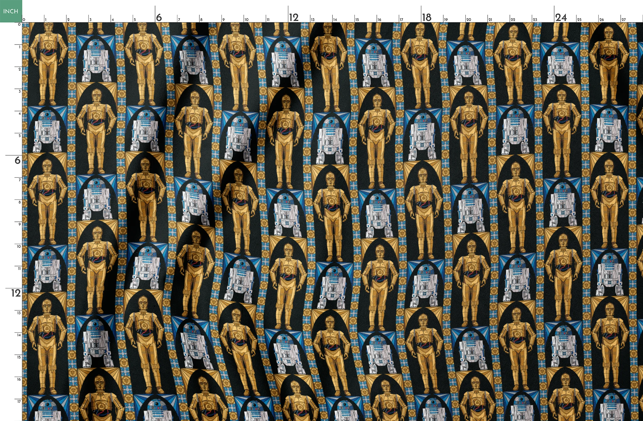 Repeating pattern of golden droid and blue-white astromech droid characters from Star Wars on black background with decorative borders springs fatquarter mockup