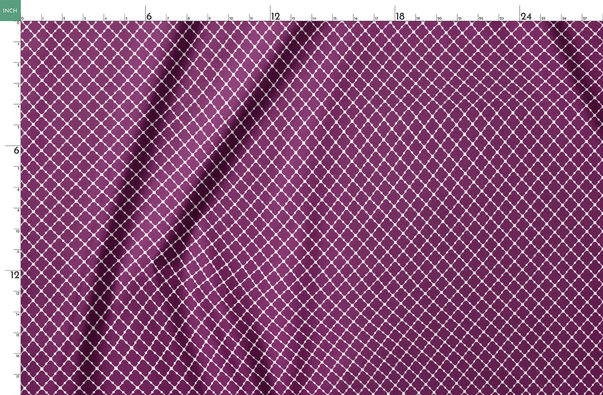 Plum quatrefoil pattern with white lattice outline on deep plum background springs fatquarter mockup