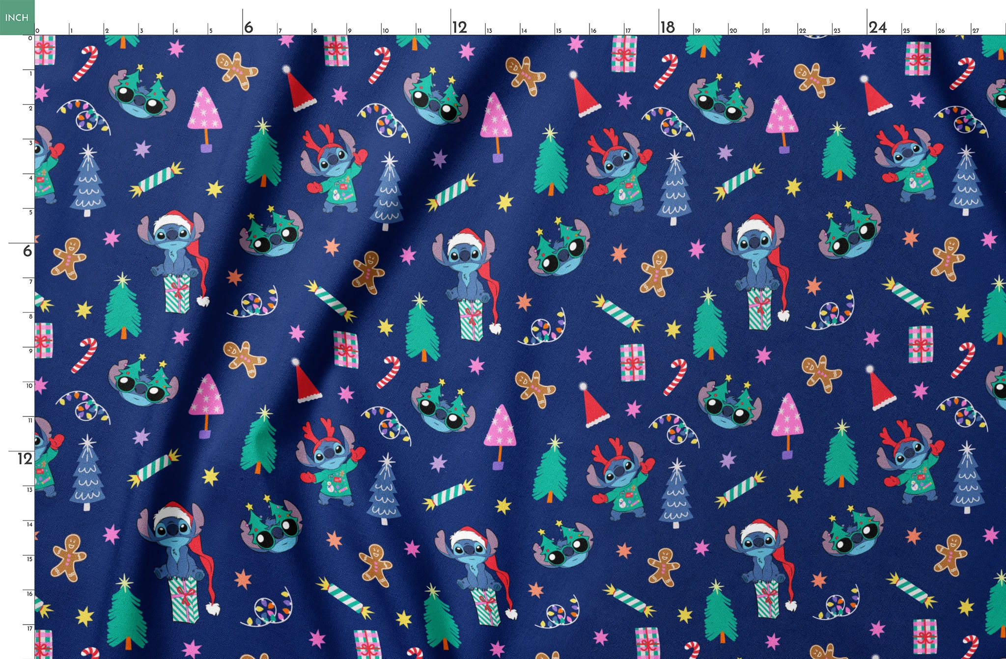Festive Christmas pattern with Stitch, trees, candy canes, presents, and gingerbread men on navy background springs fatquarter mockup