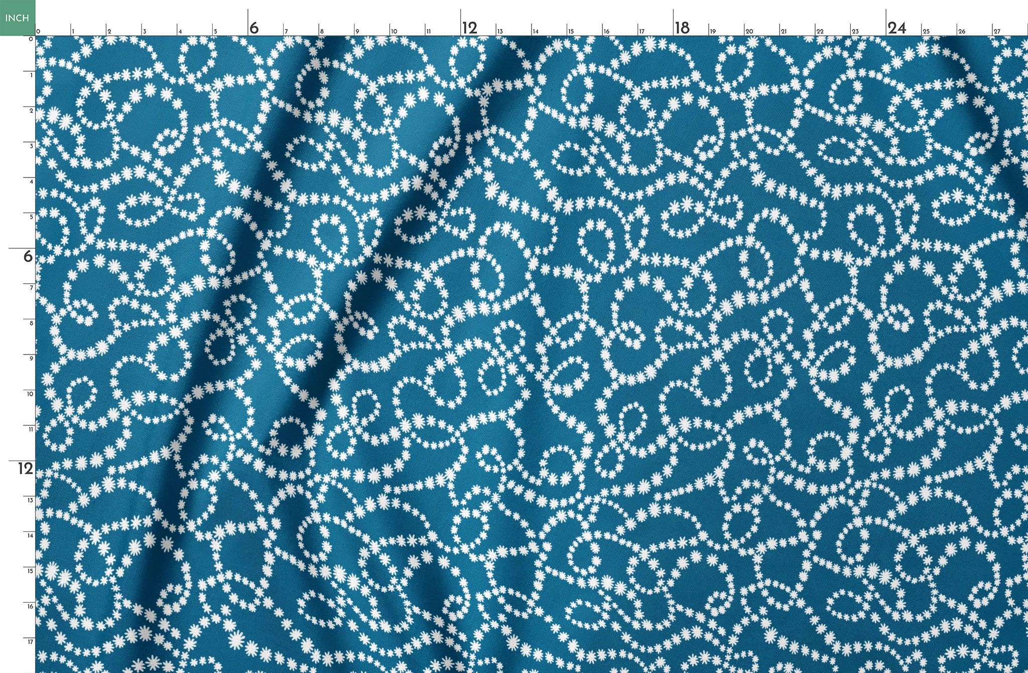 Dotted white swirling patterns on deep teal blue background creating abstract curved designs springs fatquarter mockup