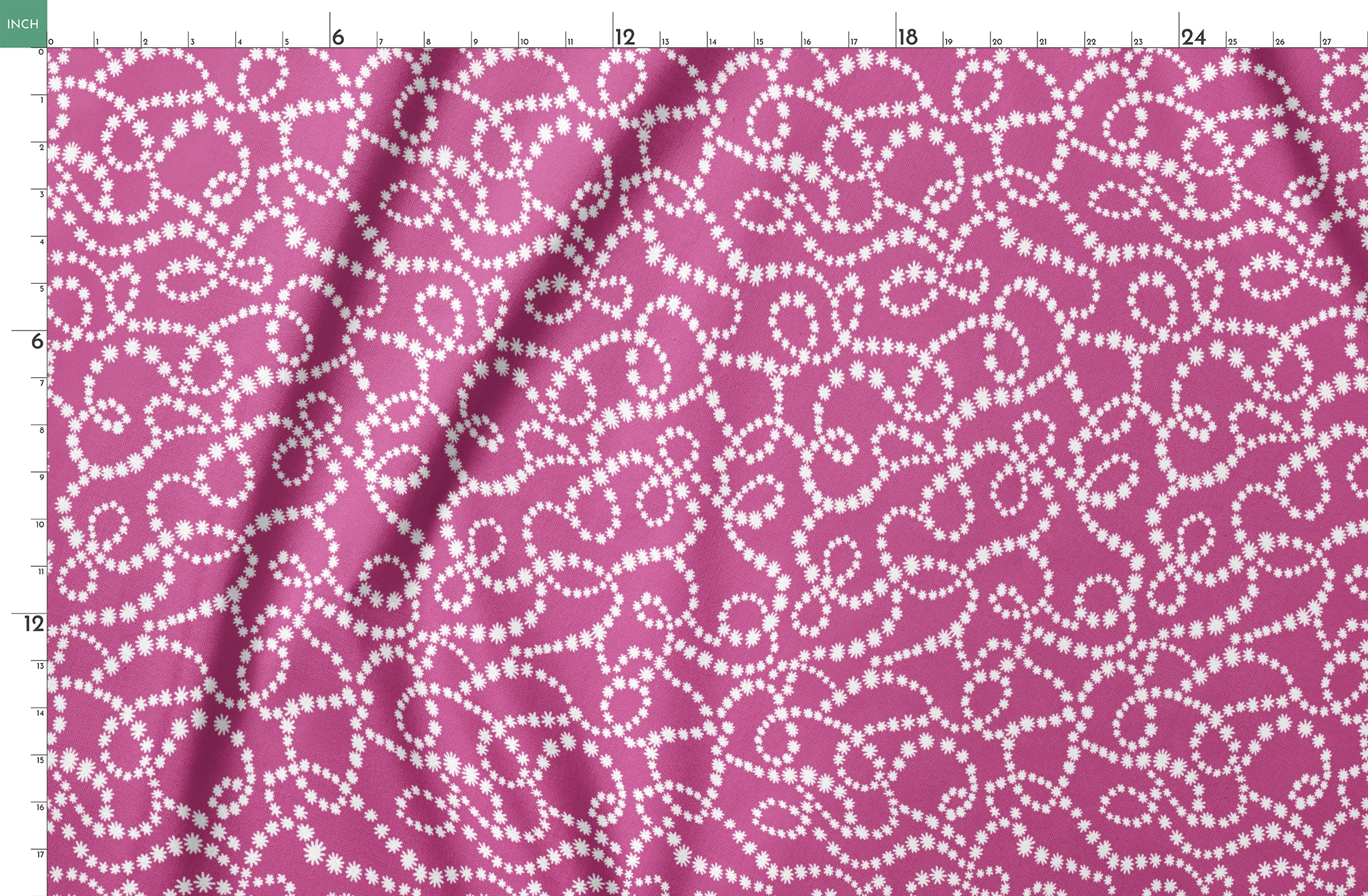 Magenta background with swirling white dotted pattern resembling pearl strands in decorative loops springs fatquarter mockup