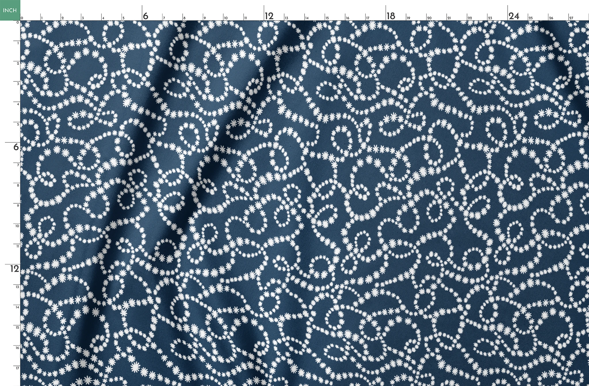 Navy blue background with swirling white dotted patterns creating circular and flowing designs springs fatquarter mockup