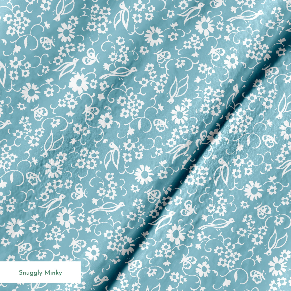 White vintage-style bird and floral silhouettes on a dusty blue background. springs minky texture