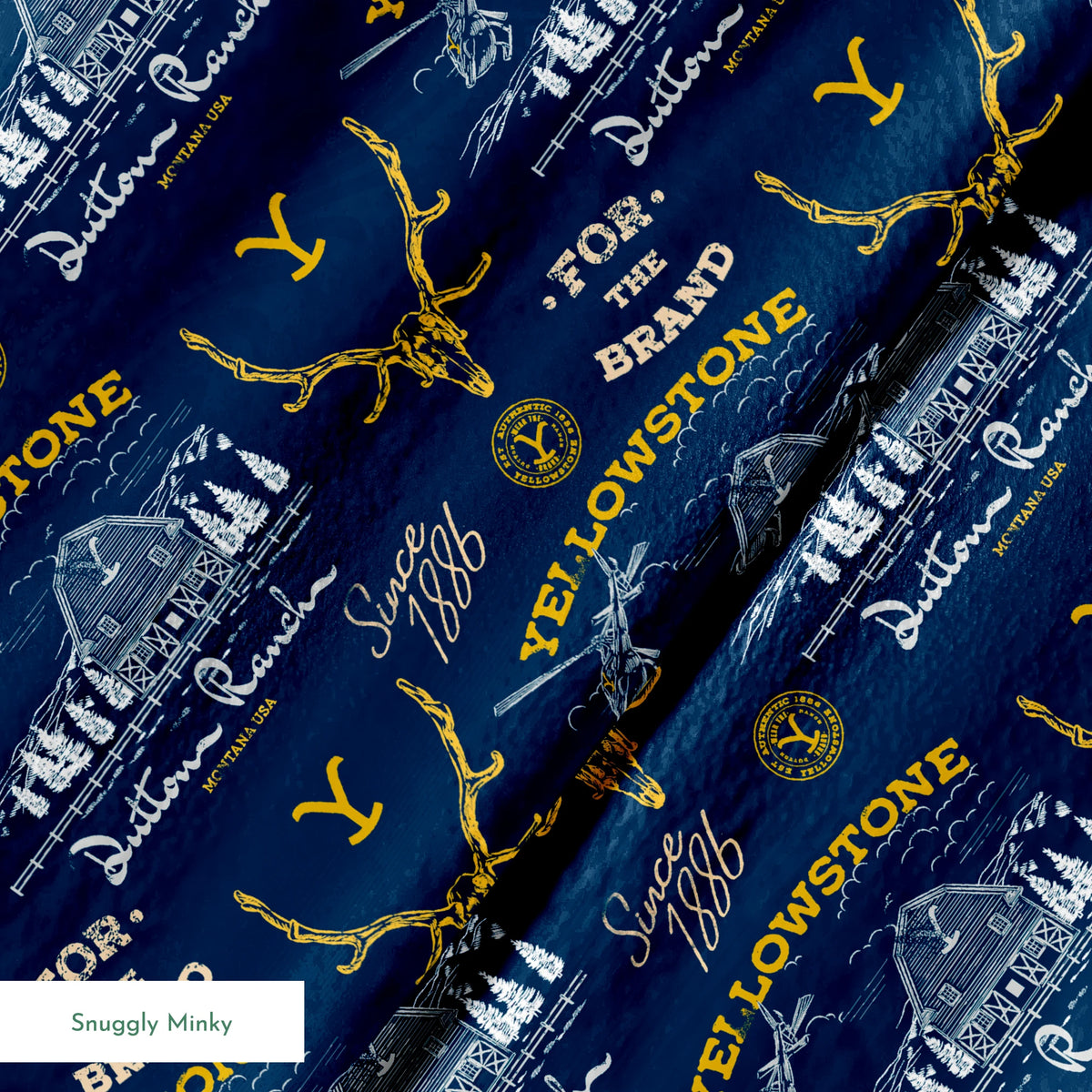 Yellowstone-themed pattern with Dutton Ranch logos, deer antlers, and "Y" branding on navy blue background springs minky texture