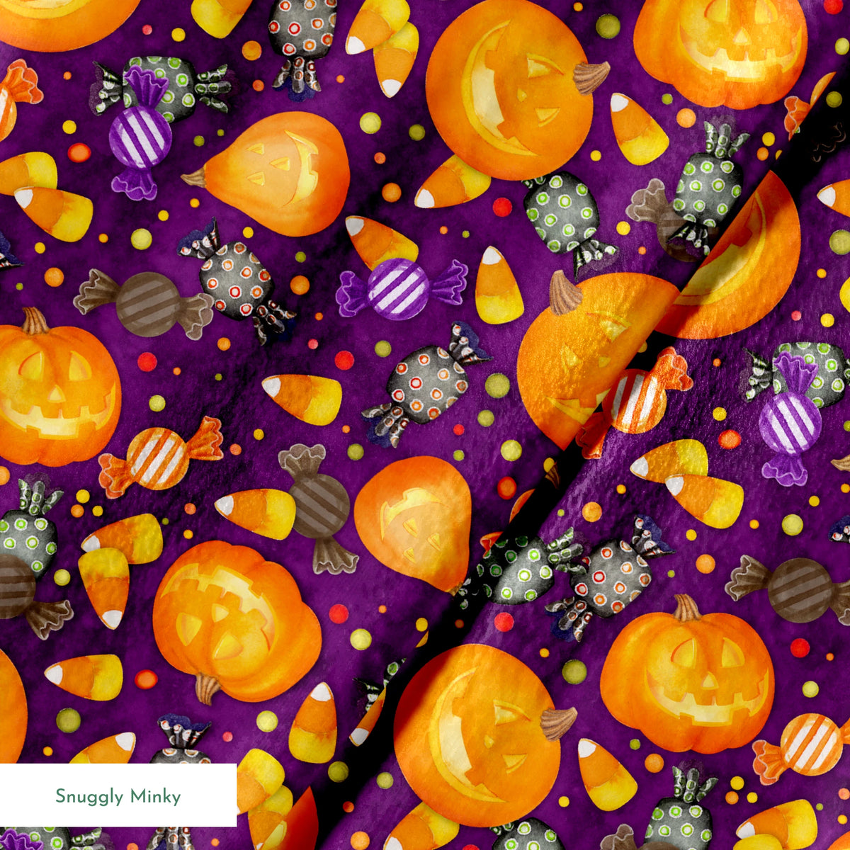 Playful Halloween fabric design by Nicole Tamarin featuring smiling jack-o’-lanterns, wrapped candies, and candy corn scattered across a purple background. springs minky texture