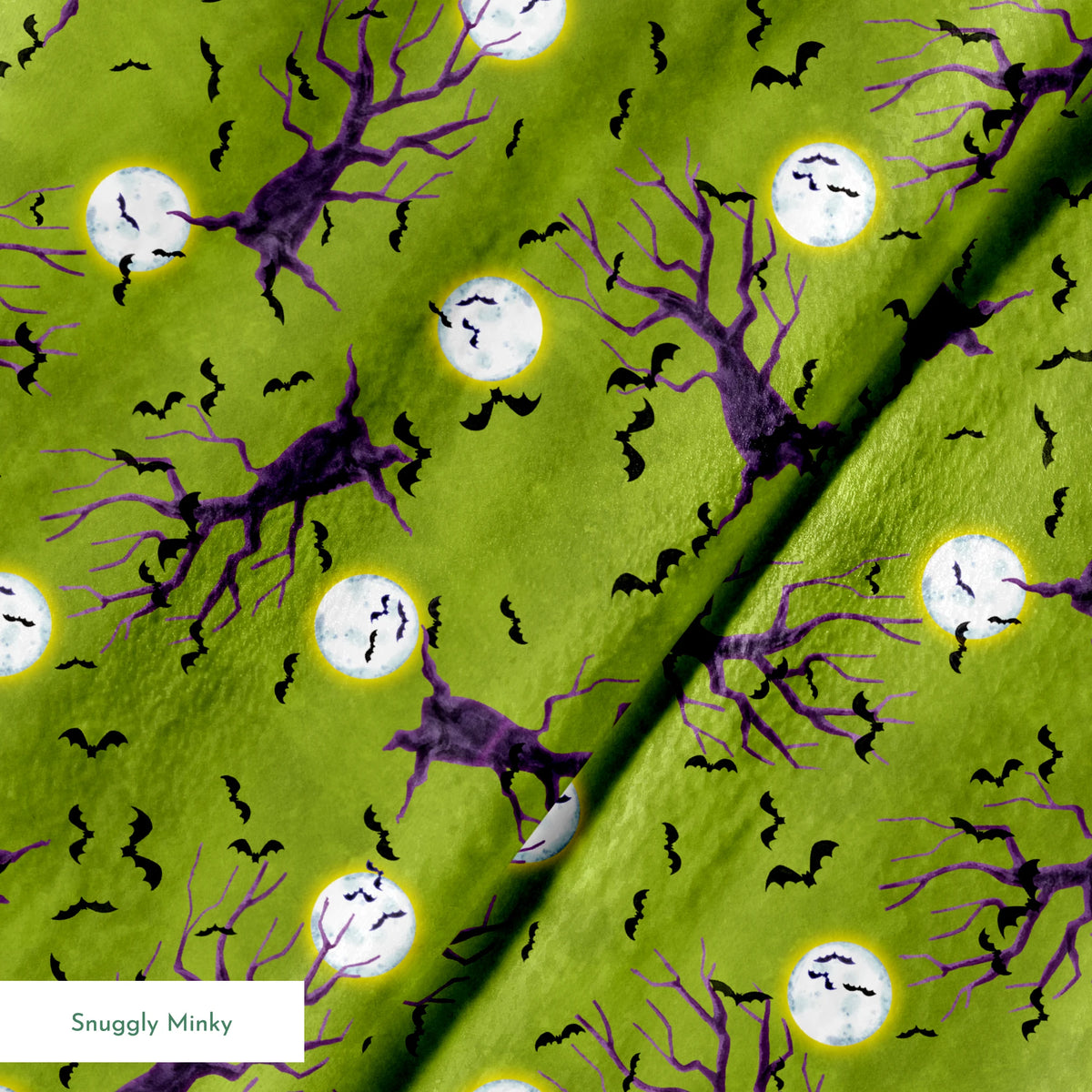 Halloween fabric design with purple haunted trees, bats, and glowing moons on a green background, illustrated by Nicole Tamarin. springs minky texture