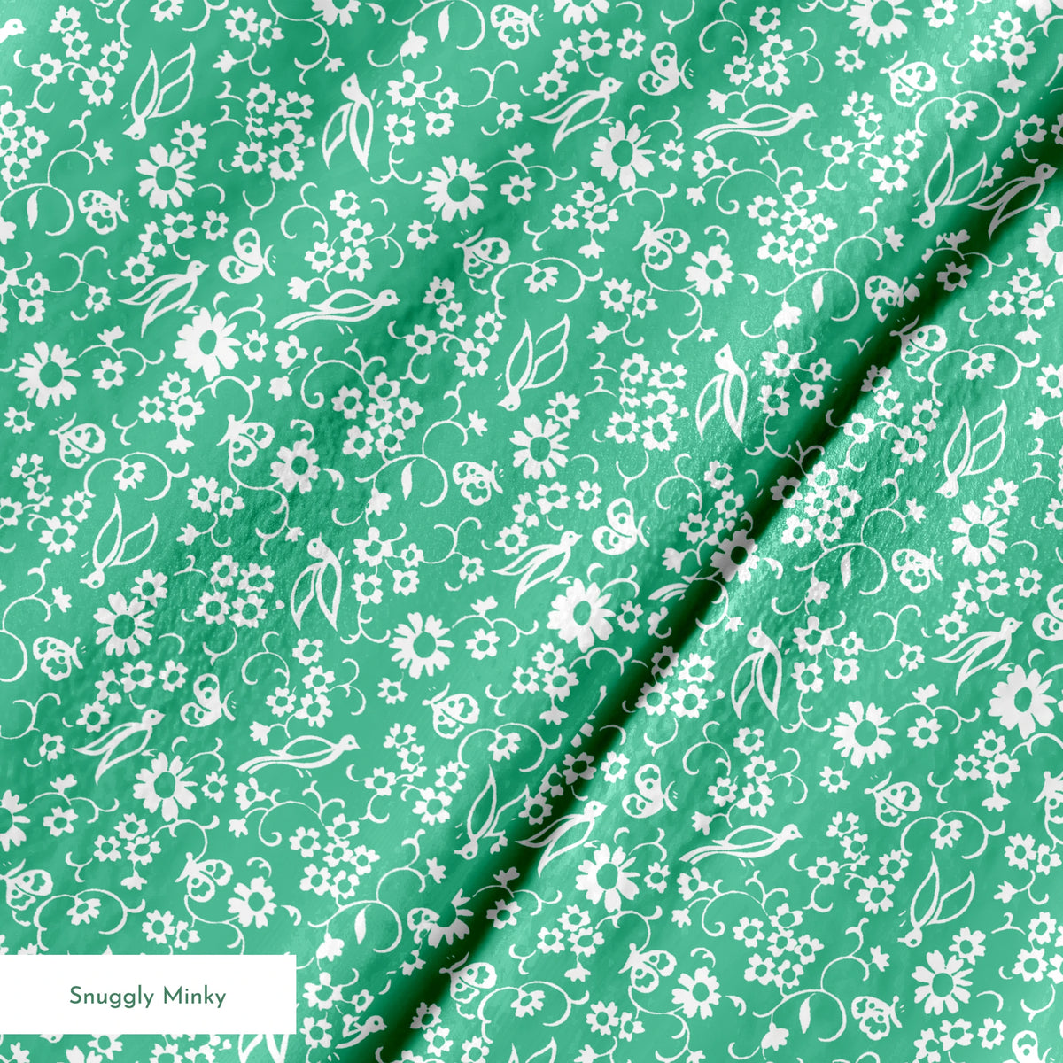 White floral pattern with delicate blooms and leaves on a mint green background springs minky texture