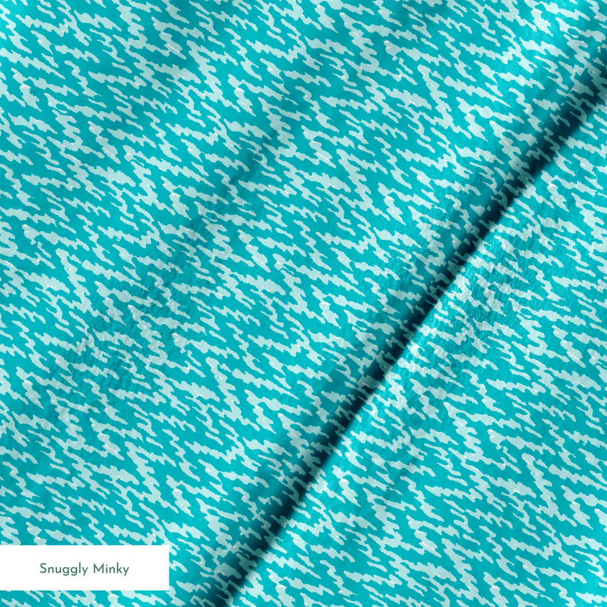 Turquoise and light blue abstract pattern with irregular vertical brush-like streaks springs minky texture