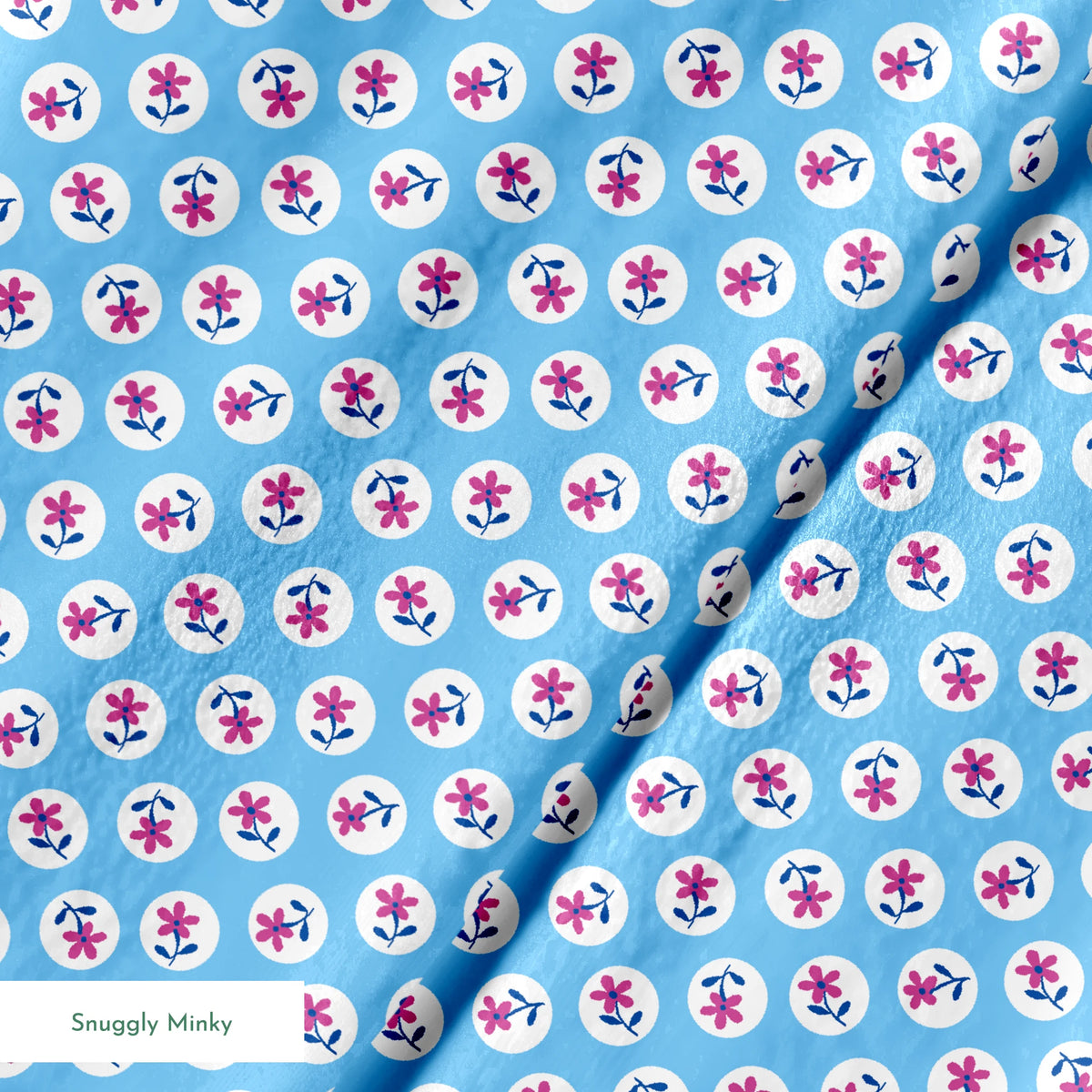 Purple flowers with blue stems inside white circles on light blue background pattern springs minky texture