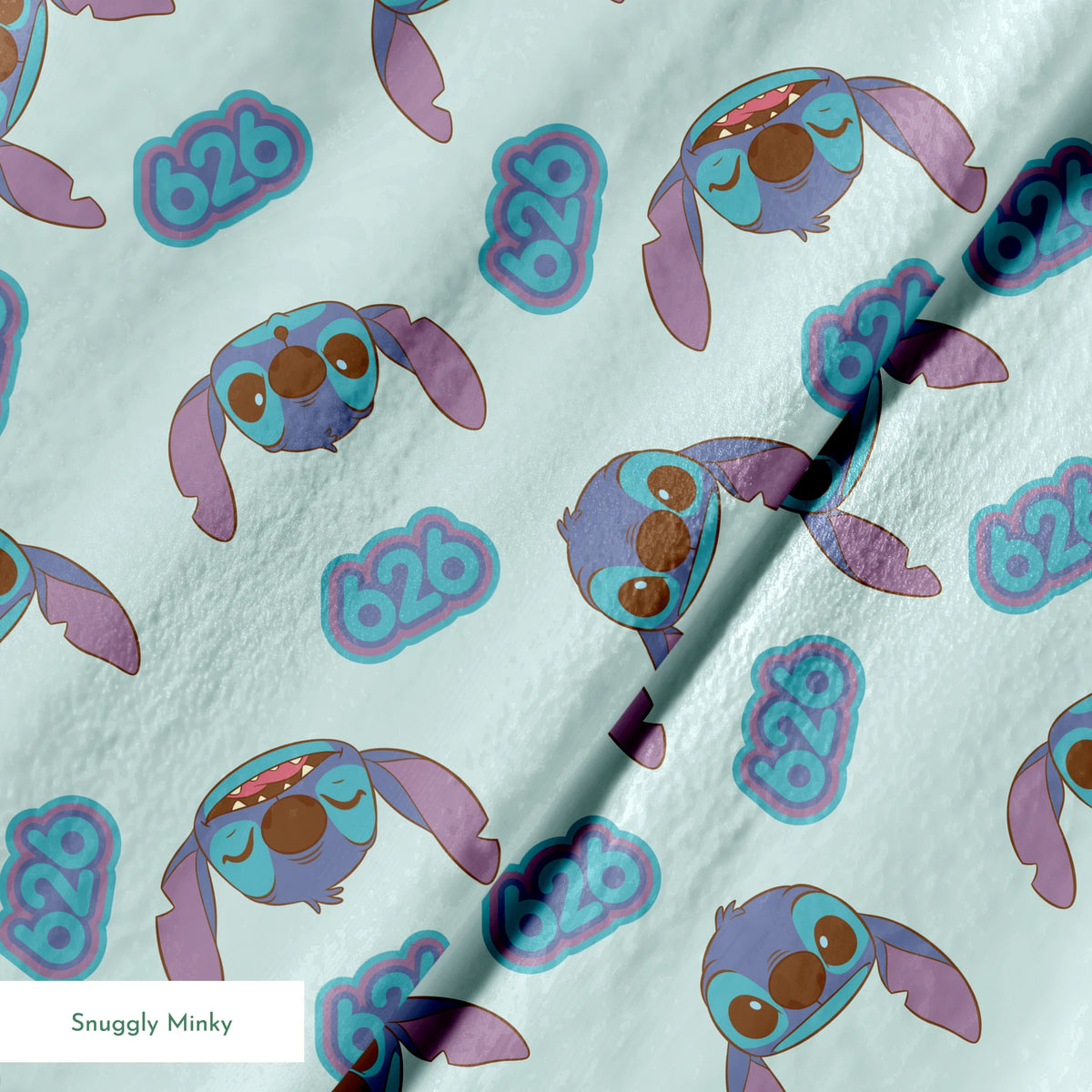 Blue cartoon creatures with large ears and swirl patterns on light teal background springs minky texture