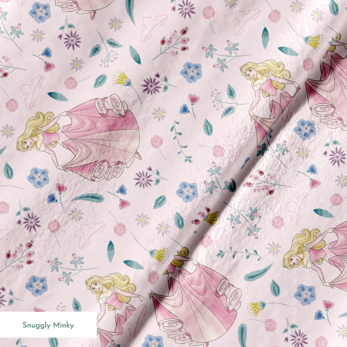 Disney's Sleeping Beauty surrounded by scattered flowers and leaves on light pink background springs minky texture
