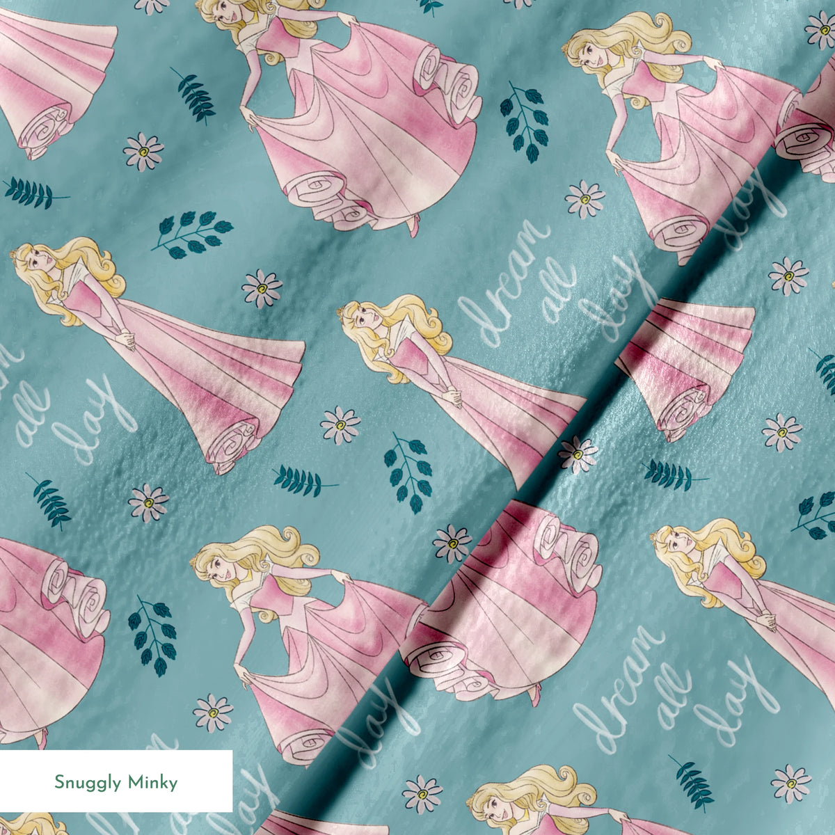 Sleeping Beauty pattern with "dream all day" text on teal background with floral elements springs minky texture