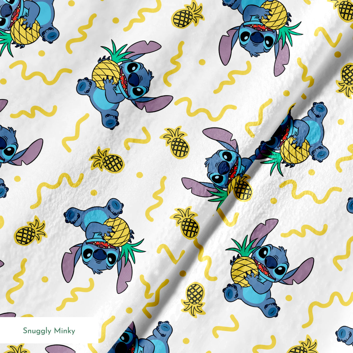 Disney's Stitch holding pineapples with yellow squiggly lines on white background pattern springs minky texture